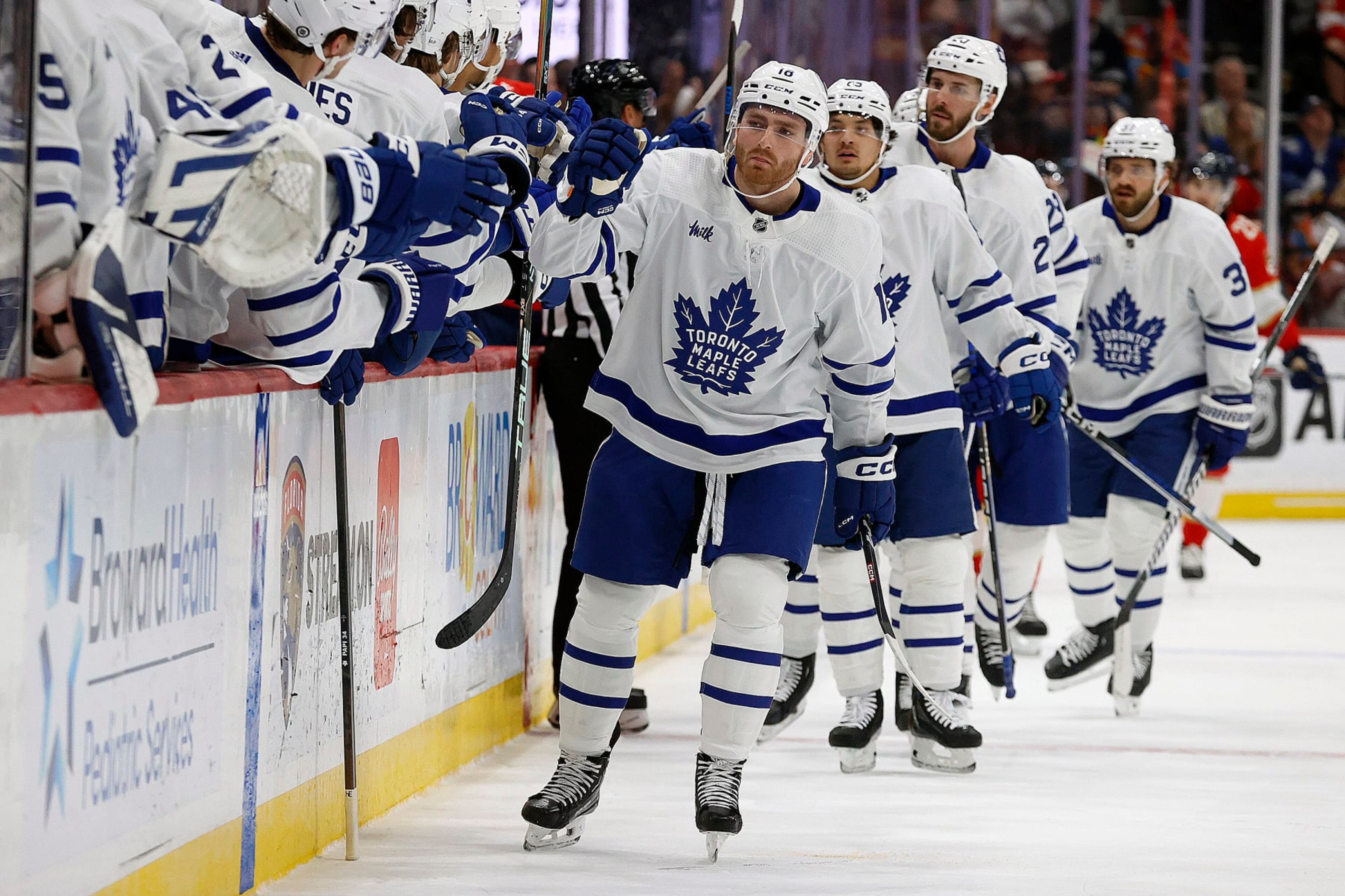 SUNRISE, FLORIDA - APRIL 16: Noah Gregor #18 of the Toronto Maple Leafs celebrates his goal with teammates during the first period against the Florida Panthers at the Amerant Bank Arena on April 16, 2024 in Sunrise, Florida. (Photo by Eliot J. Schechter/NHLI via Getty Images)