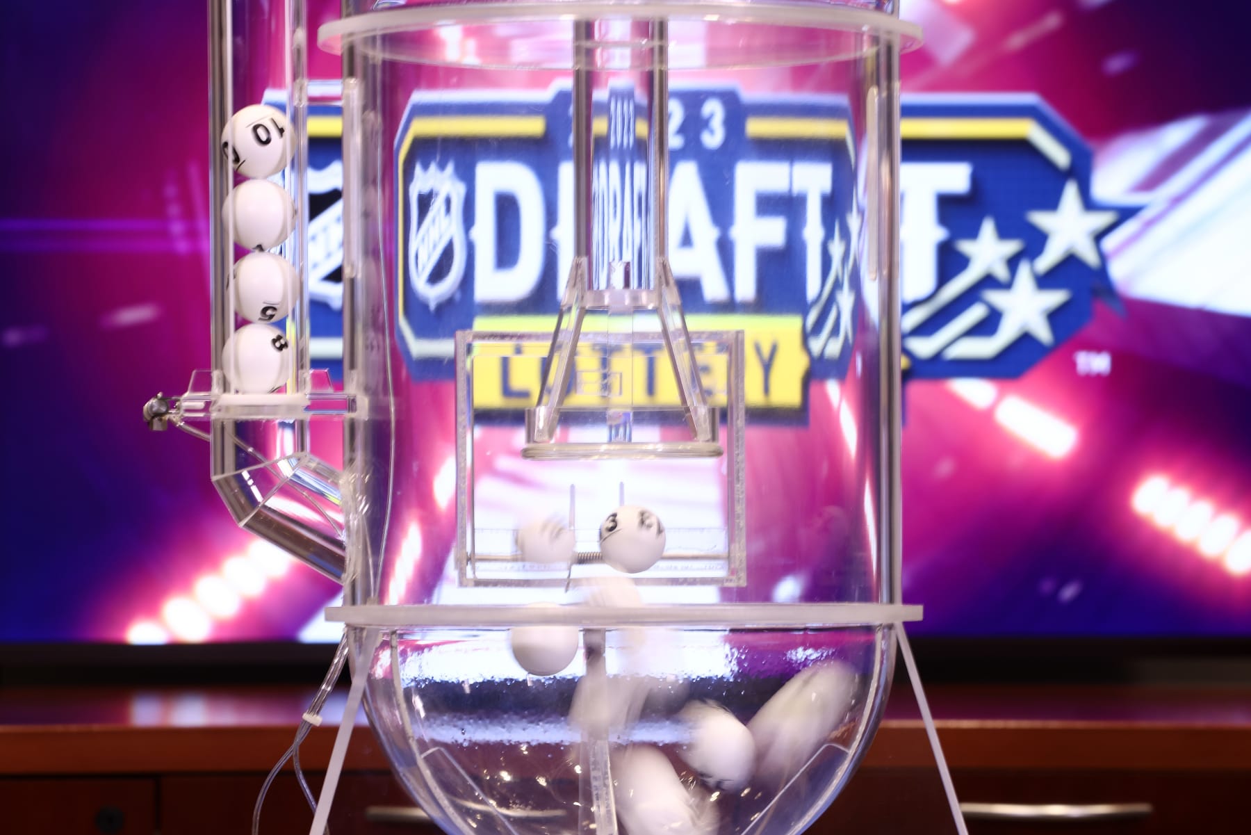 SECAUCUS, NEW JERSEY - MAY 08: The lottery balls take flight during the 2023 NHL Draft Lottery on May 08, 2023 at NHL Network Studio in Secaucus, New Jersey. (Photo by Mike Stobe/NHLI via Getty Images)
