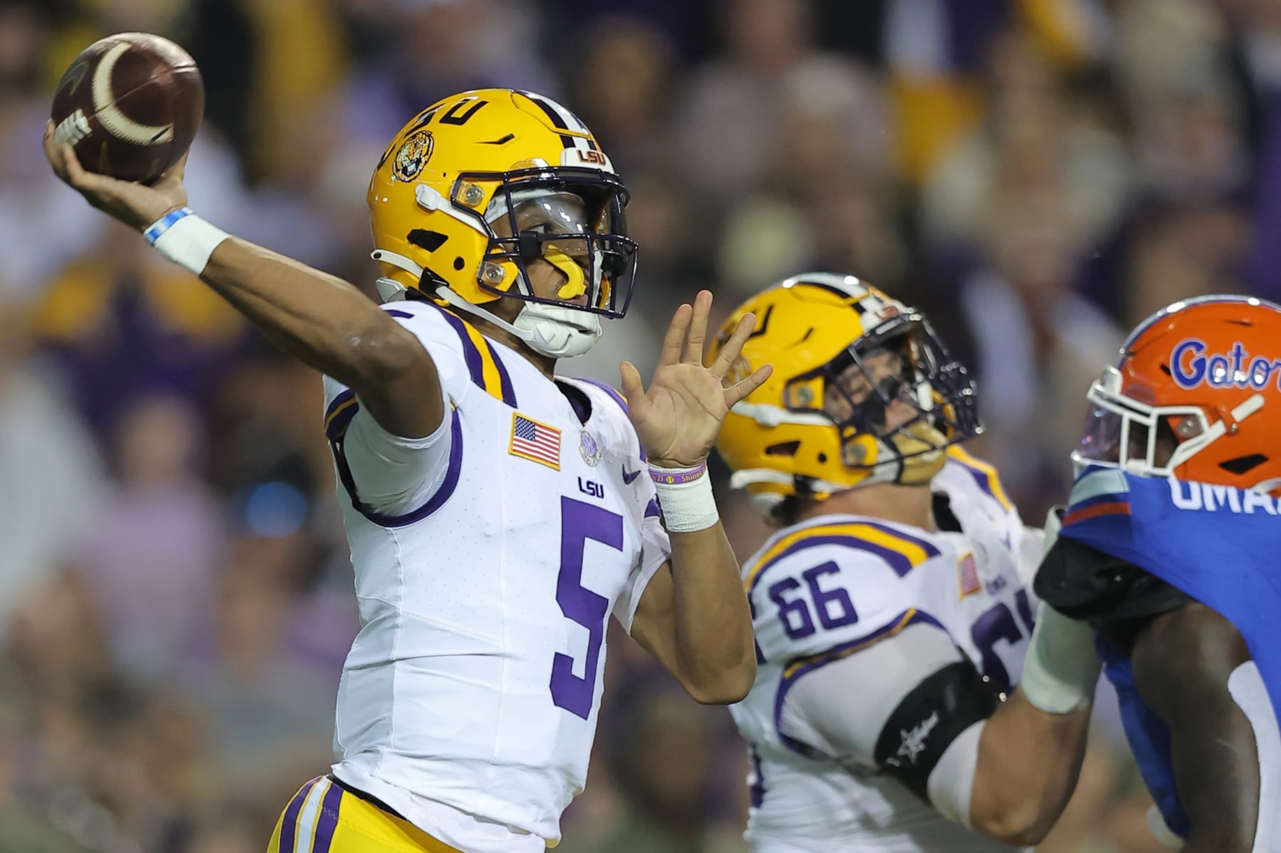 BATON ROUGE, LOUISIANA - NOVEMBER 11: Jayden Daniels #5 of the LSU Tigers throws the ball during the first half against the Florida Gators at Tiger Stadium on November 11, 2023 in Baton Rouge, Louisiana. (Photo by Jonathan Bachman/Getty Images)