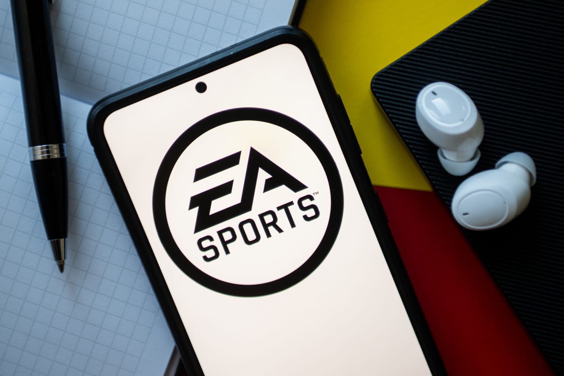 POLAND - 2023/11/02: In this photo illustration an EA Sports logo seen displayed on a smartphone. (Photo Illustration by Mateusz Slodkowski/SOPA Images/LightRocket via Getty Images)