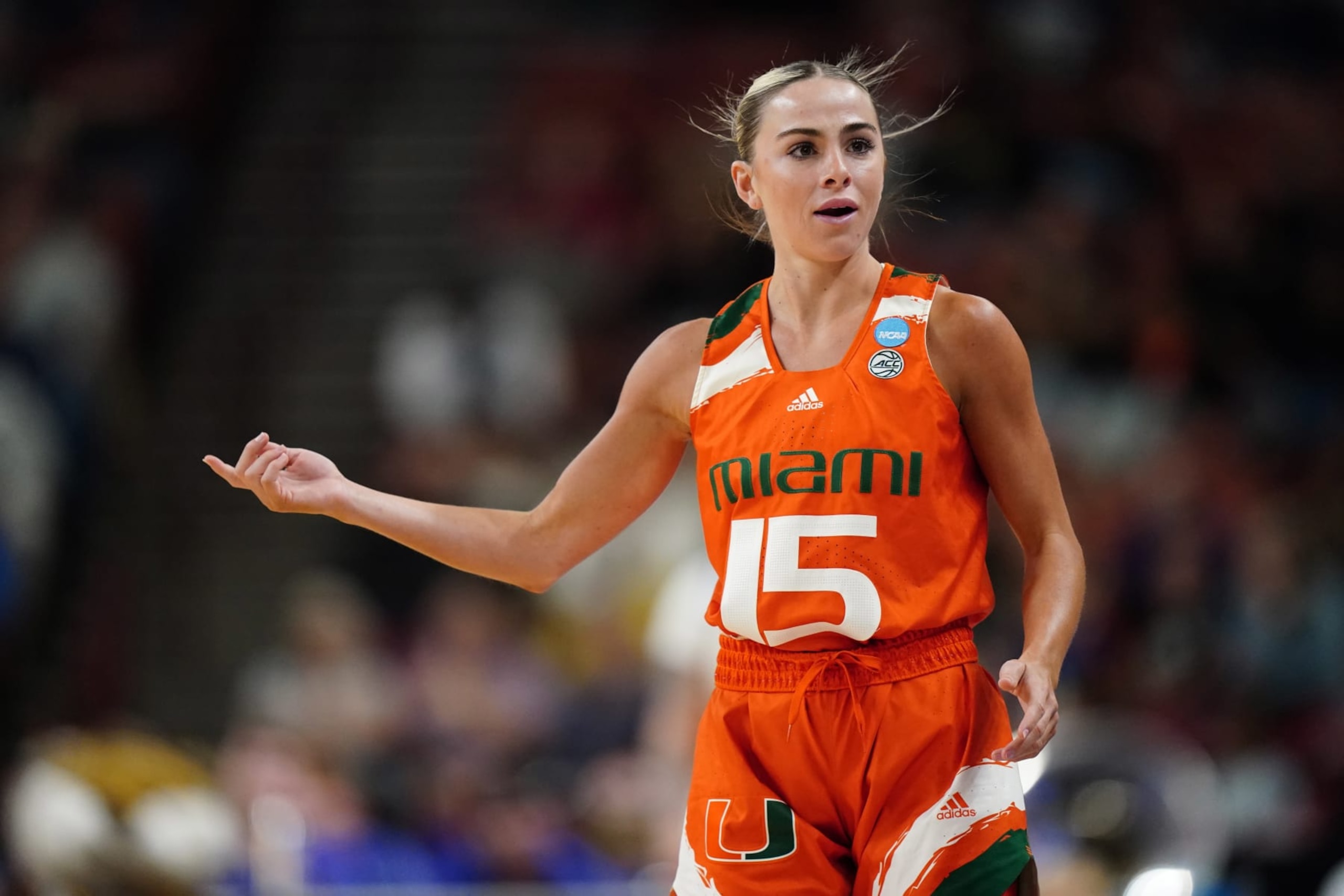 GREENVILLE, SC - MARCH 26: Hanna Cavinder #15 of the Miami Hurricanes reacts to the game against the LSU Lady Tigers during the Elite Eight round of the 2023 NCAA Womens Basketball Tournament held at Bon Secours Wellness Arena on March 26, 2023 in Greenville, South Carolina. (Photo by Jacob Kupferman/NCAA Photos via Getty Images) GREENVILLE, SC - MARCH 26: Hanna Cavinder #15 of the Miami Hurricanes reacts to the game against the LSU Lady Tigers during the Elite Eight round of the 2023 NCAA Womens Basketball Tournament held at Bon Secours Wellness Arena on March 26, 2023 in Greenville, South Carolina. (Photo by Jacob Kupferman/NCAA Photos via Getty Images)
