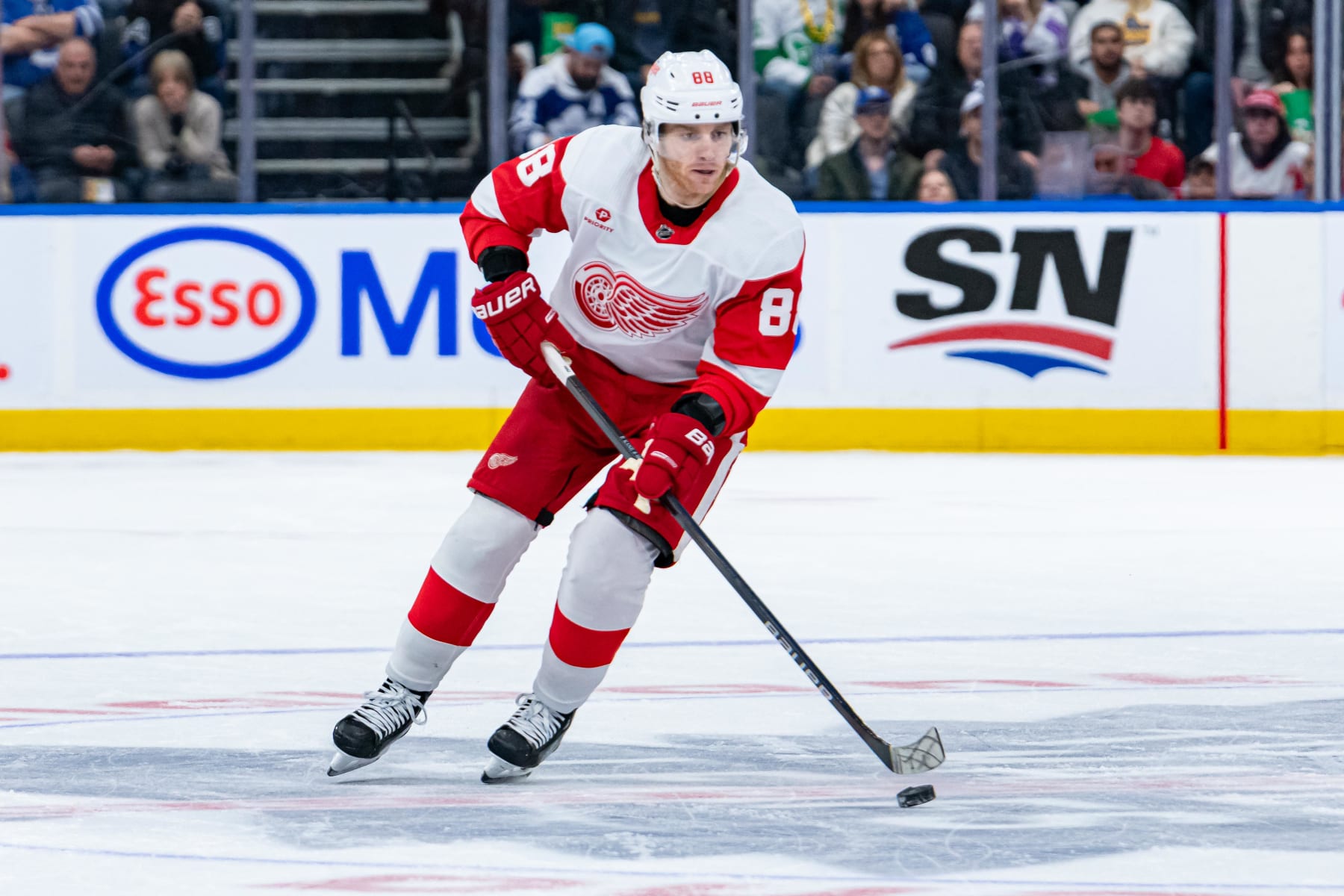 TORONTO, ON - APRIL 13: Detroit Red Wings Right Wing Patrick Kane (88) skates with the puck during the NHL regular season game between the Detroit Red Wings and the Toronto Maple Leafs on April 13, 2024, at Scotiabank Arena in Toronto, ON, Canada. (Photo by Julian Avram/Icon Sportswire via Getty Images)