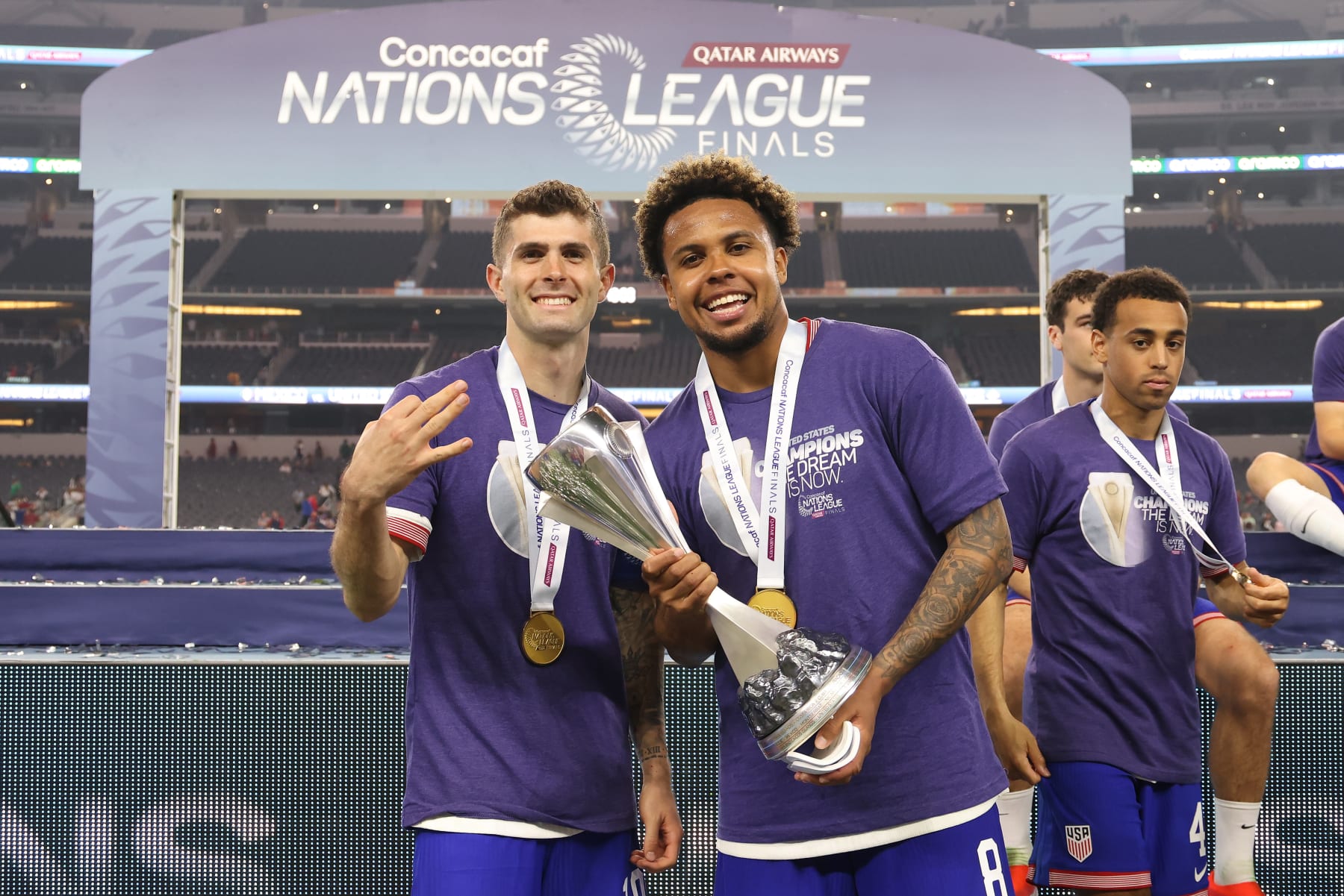 ARLINGTON, TEXAS - MARCH 24: Christian Pulisic #10 and Weston McKennie #8 of the United States pose for a photo with the Concacaf Nations League Trophy after defeating Mexico in the Concacaf Nations League Final at AT&T Stadium on March 24, 2024 in Arlington, Texas. (Photo by John Dorton/ISI Photos/USSF/Getty Images for USSF)