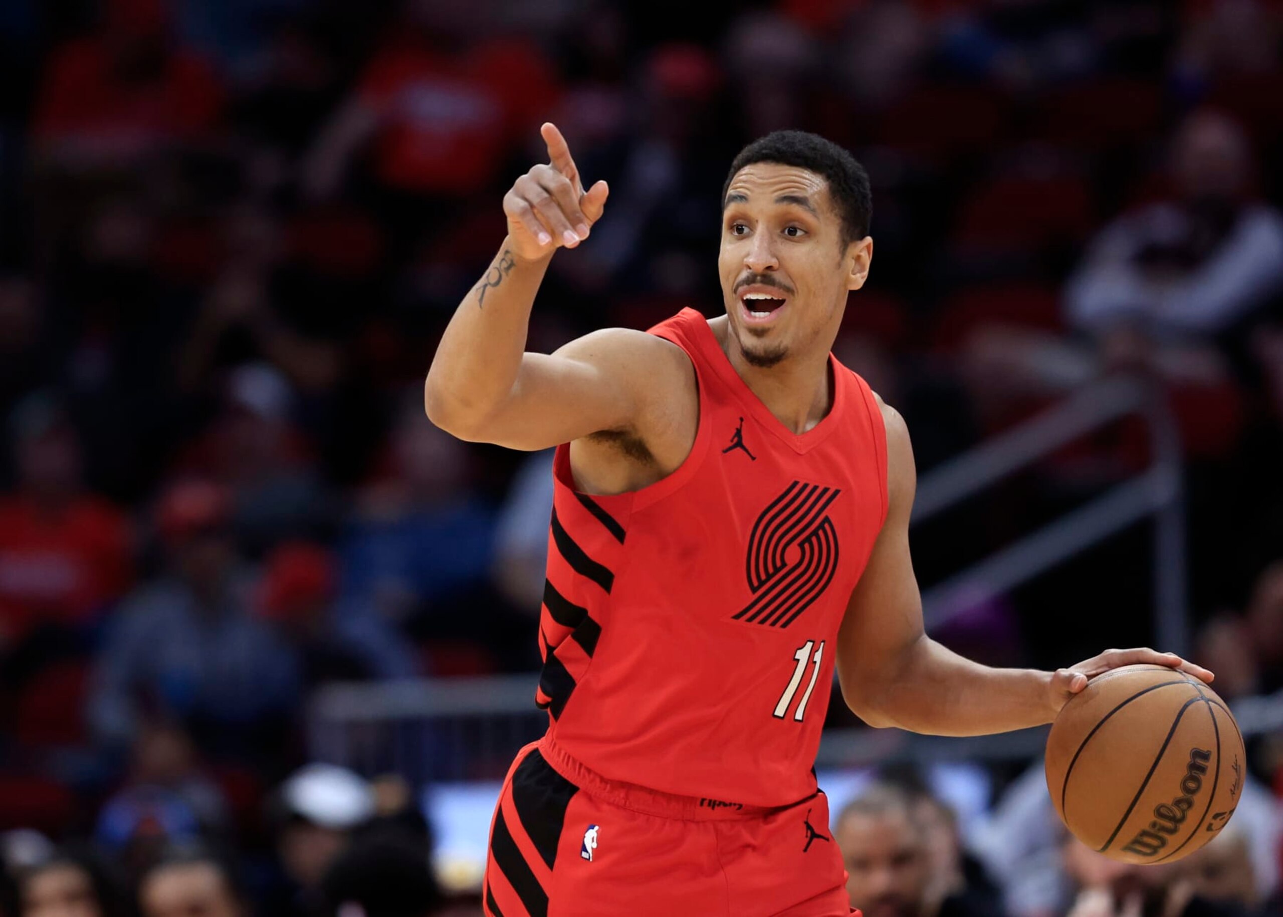 HOUSTON, TEXAS - JANUARY 24: Malcolm Brogdon #11 of the Portland Trail Blazers in action against the Houston Rockets during the first half at Toyota Center on January 24, 2024 in Houston, Texas. (Photo by Carmen Mandato/Getty Images)