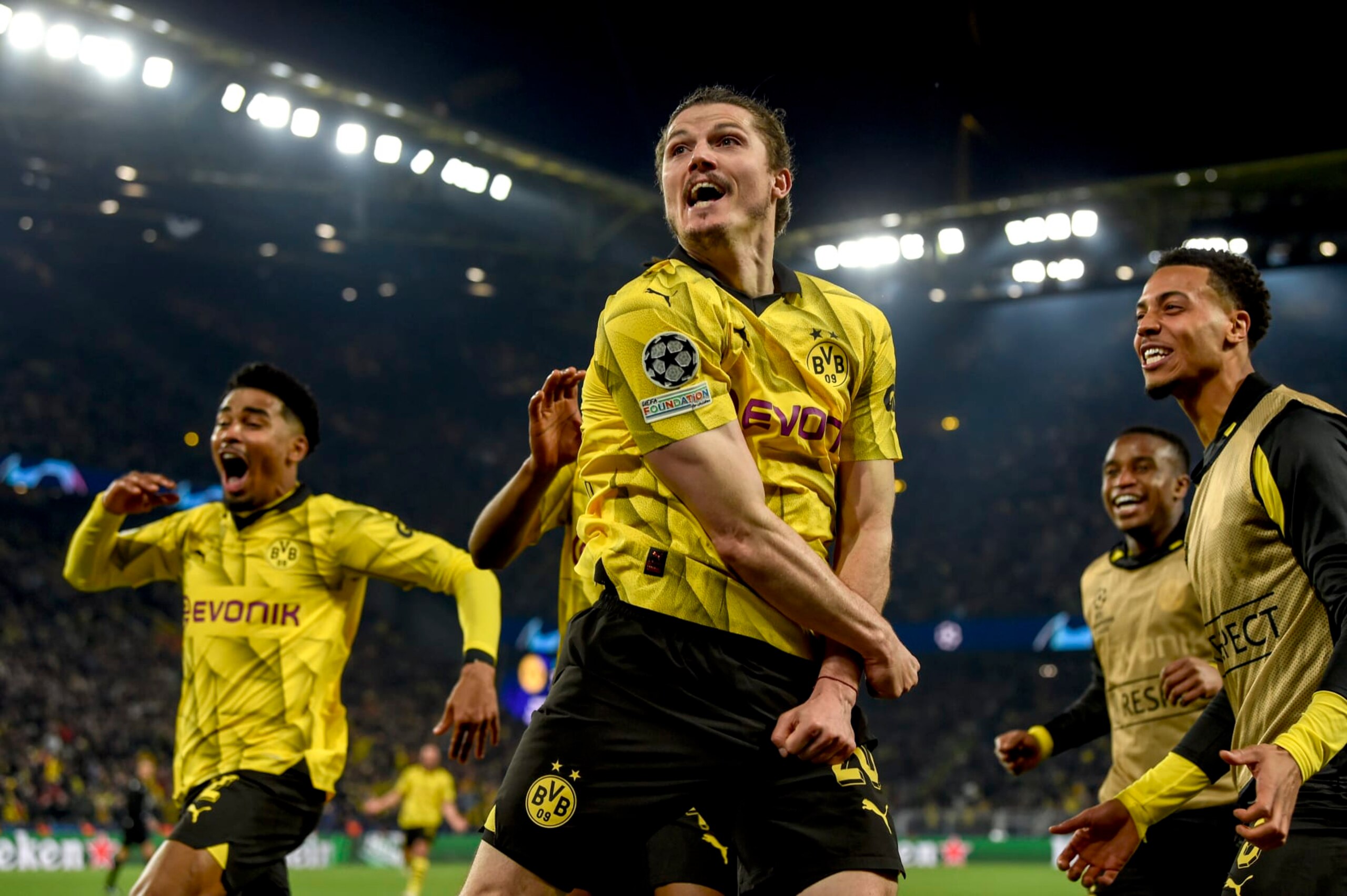 DORTMUND, GERMANY - APRIL 16: Marcel Sabitzer of Borussia Dortmund (C) celebrates with his teammates after scoring the 4-2 lead during the UEFA Champions League quarter-final second leg soccer match between Borussia Dortmund and Atletico Madrid at Signal Iduna Park on April 16, 2024 in Dortmund, Germany. (Photo by Alexandre Simoes/Borussia Dortmund via Getty Images)