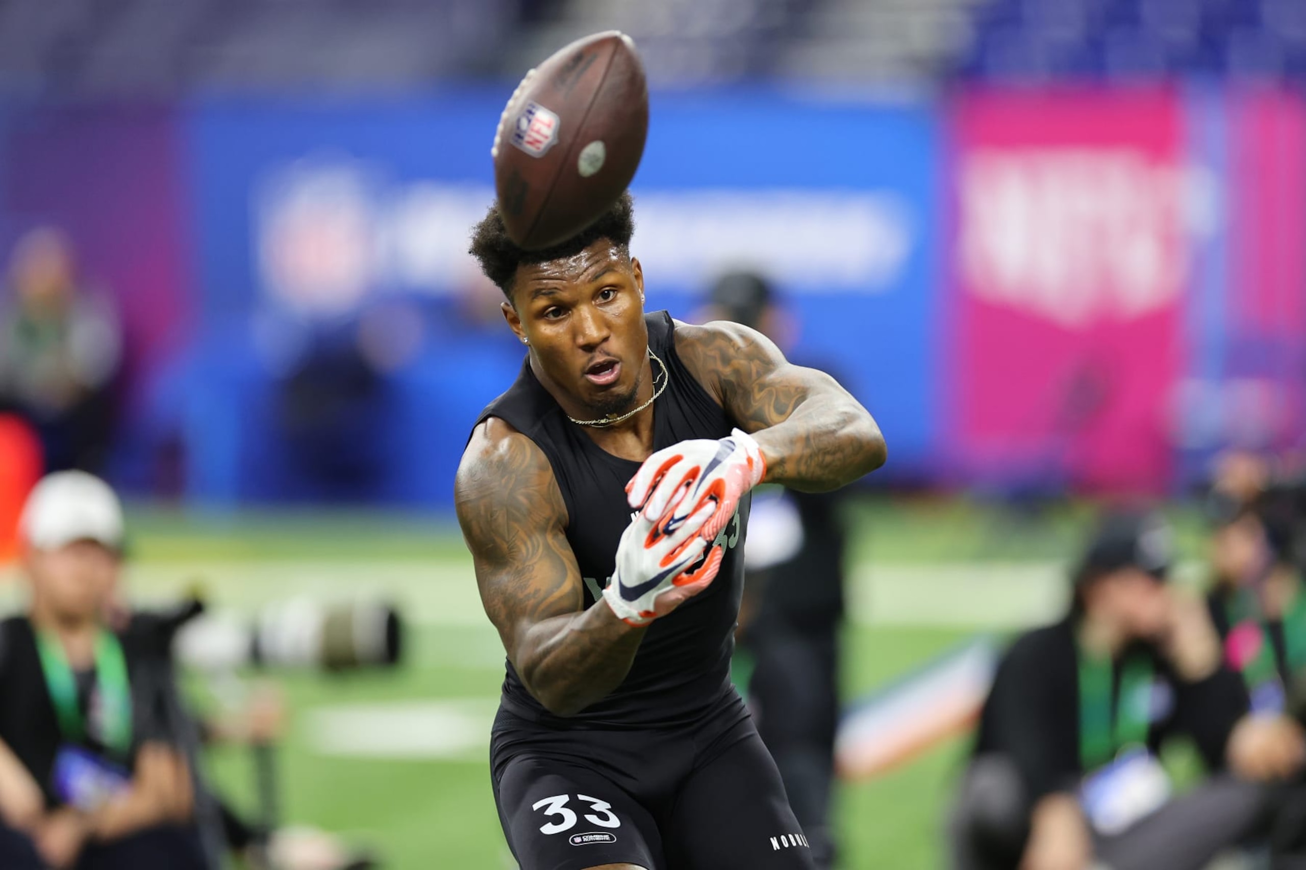 INDIANAPOLIS, INDIANA - MARCH 02: Malik Washington #WO33 of Virginia participates in a dri during the NFL Combine at Lucas Oil Stadium on March 02, 2024 in Indianapolis, Indiana. (Photo by Stacy Revere/Getty Images) INDIANAPOLIS, INDIANA - MARCH 02: Malik Washington #WO33 of Virginia participates in a dri during the NFL Combine at Lucas Oil Stadium on March 02, 2024 in Indianapolis, Indiana. (Photo by Stacy Revere/Getty Images)