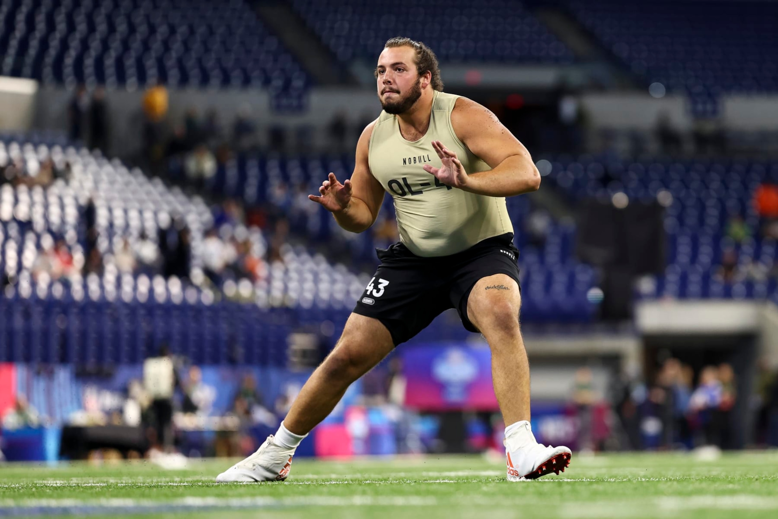 INDIANAPOLIS, INDIANA - MARCH 3: Matt Lee #OL43 of Miami-Fl participates in a drill during the NFL Combine at the Lucas Oil Stadium on March 3, 2024 in Indianapolis, Indiana. (Photo by Kevin Sabitus/Getty Images) INDIANAPOLIS, INDIANA - MARCH 3: Matt Lee #OL43 of Miami-Fl participates in a drill during the NFL Combine at the Lucas Oil Stadium on March 3, 2024 in Indianapolis, Indiana. (Photo by Kevin Sabitus/Getty Images)
