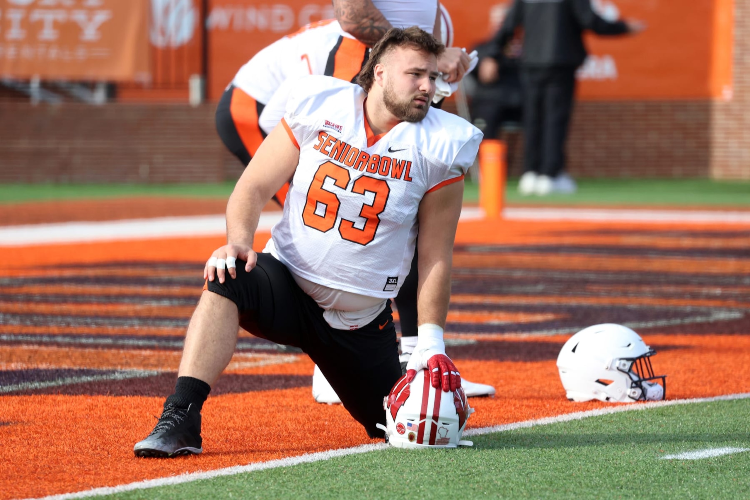MOBILE, AL - FEBRUARY 01: National offensive lineman Tanor Bortolini of Wisconsin (63) during the National team practice for the Reese's Senior Bowl on February 31, 2024 at Hancock Whitney Stadium in Mobile, Alabama. (Photo by Michael Wade/Icon Sportswire via Getty Images) MOBILE, AL - FEBRUARY 01: National offensive lineman Tanor Bortolini of Wisconsin (63) during the National team practice for the Reese's Senior Bowl on February 31, 2024 at Hancock Whitney Stadium in Mobile, Alabama. (Photo by Michael Wade/Icon Sportswire via Getty Images)