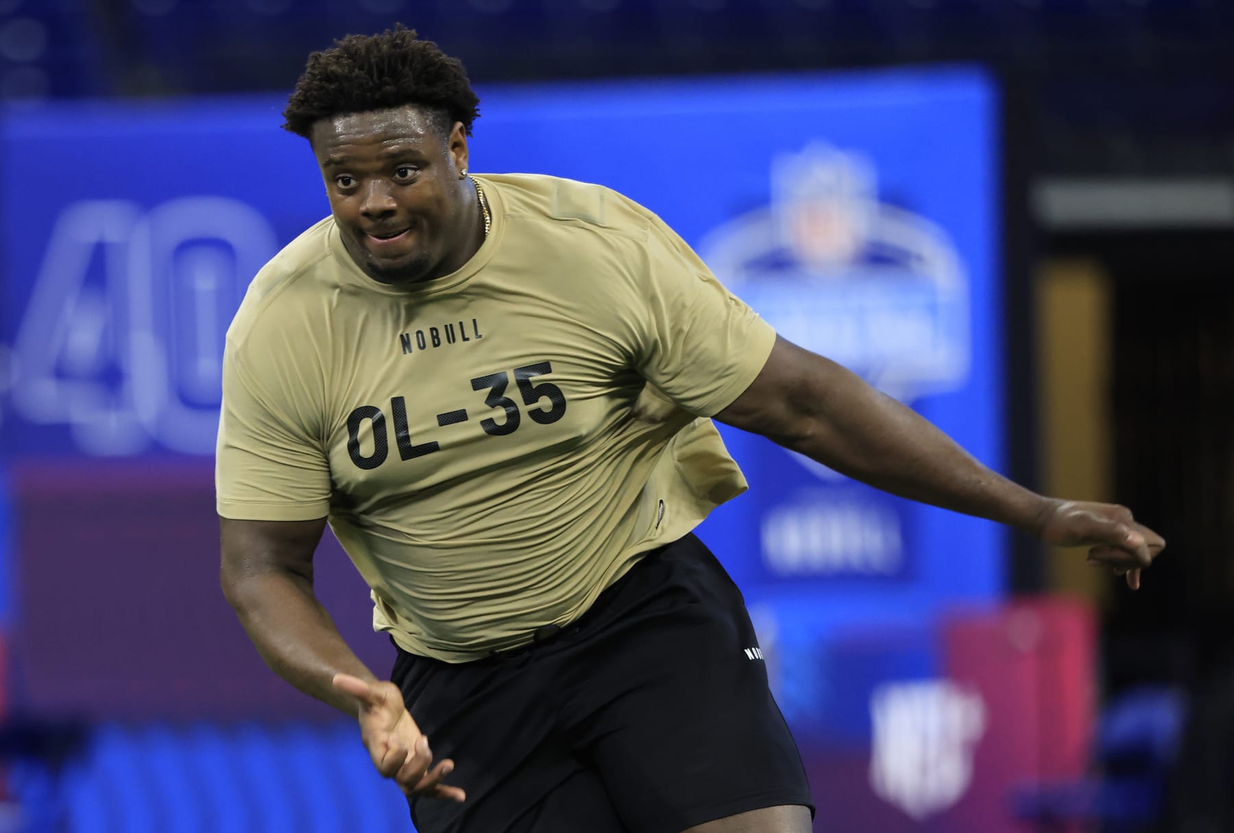 INDIANAPOLIS, INDIANA - MARCH 03: Christian Jones #OL35 of the Texas  participates in a drill during the NFL Combine at Lucas Oil Stadium on March 03, 2024 in Indianapolis, Indiana. (Photo by Justin Casterline/Getty Images)