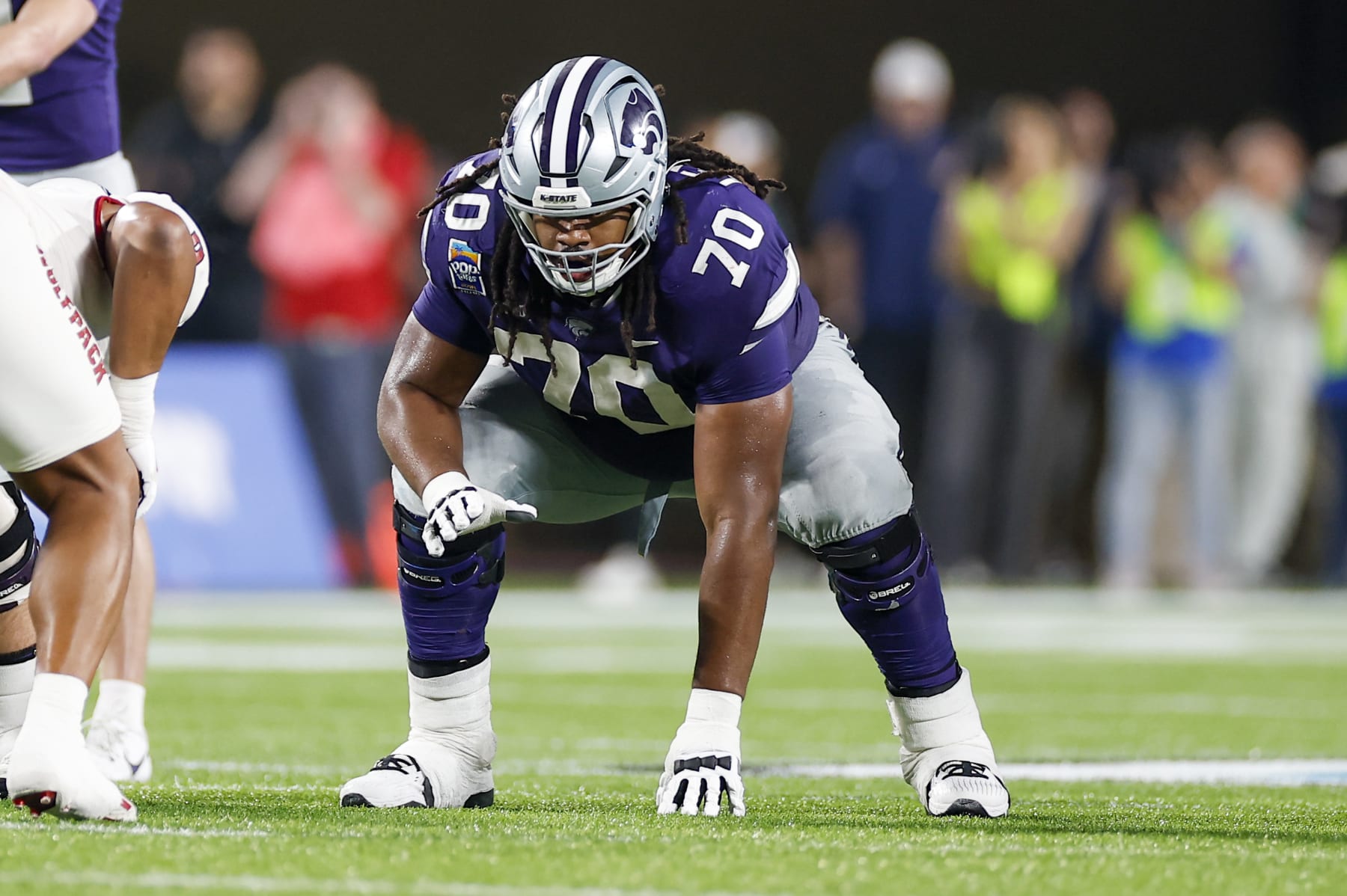ORLANDO, FL - DECEMBER 28: Kansas State Wildcats offensive lineman KT Leveston (70) lines up for a play during the game between the North Carolina State Wolfpack and the Kansas State Wildcats on December 28, 2023 at Camping World Stadium in Orlando, Fl. (Photo by David Rosenblum/Icon Sportswire via Getty Images)