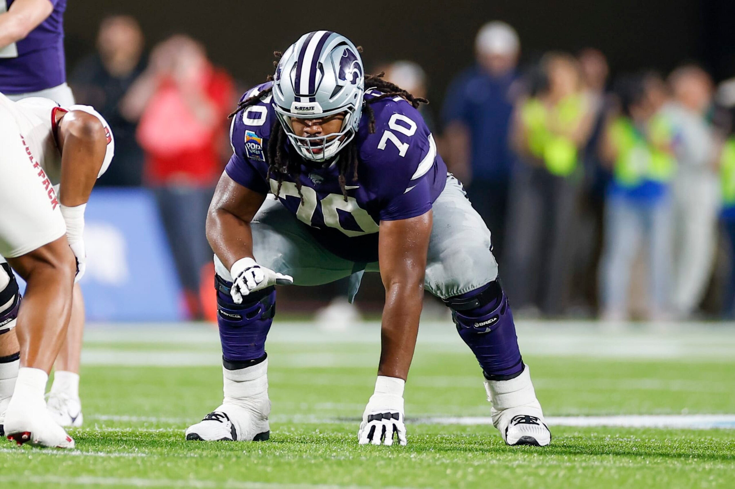 ORLANDO, FL - DECEMBER 28: Kansas State Wildcats offensive lineman KT Leveston (70) lines up for a play during the game between the North Carolina State Wolfpack and the Kansas State Wildcats on December 28, 2023 at Camping World Stadium in Orlando, Fl. (Photo by David Rosenblum/Icon Sportswire via Getty Images)