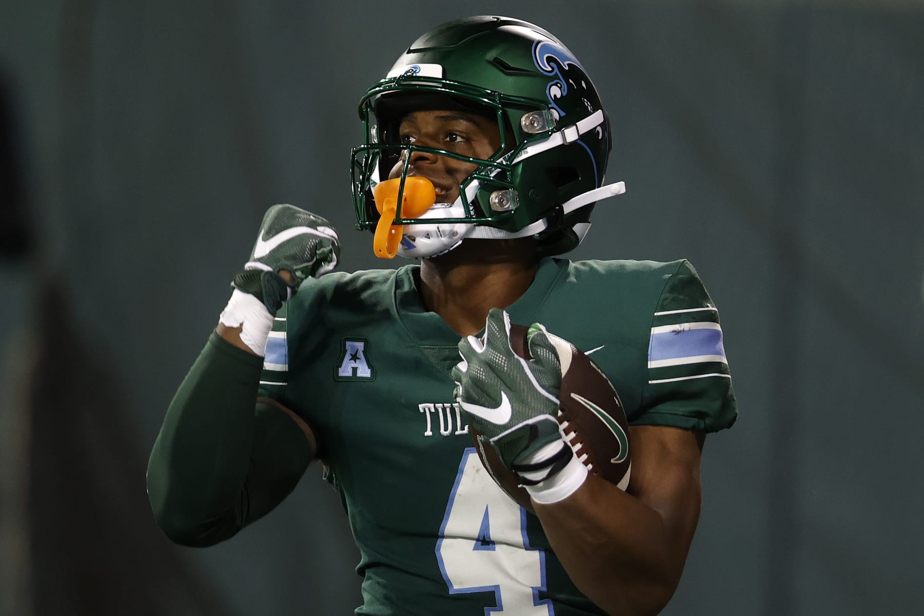 NEW ORLEANS, LOUISIANA - SEPTEMBER 02: Jha'Quan Jackson #4  of Tulane University Green Wave scores a touchdown against the University of Southern Alabama at Yulman Stadium on September 02, 2023 in New Orleans, Louisiana. (Photo by Chris Graythen/Getty Images)