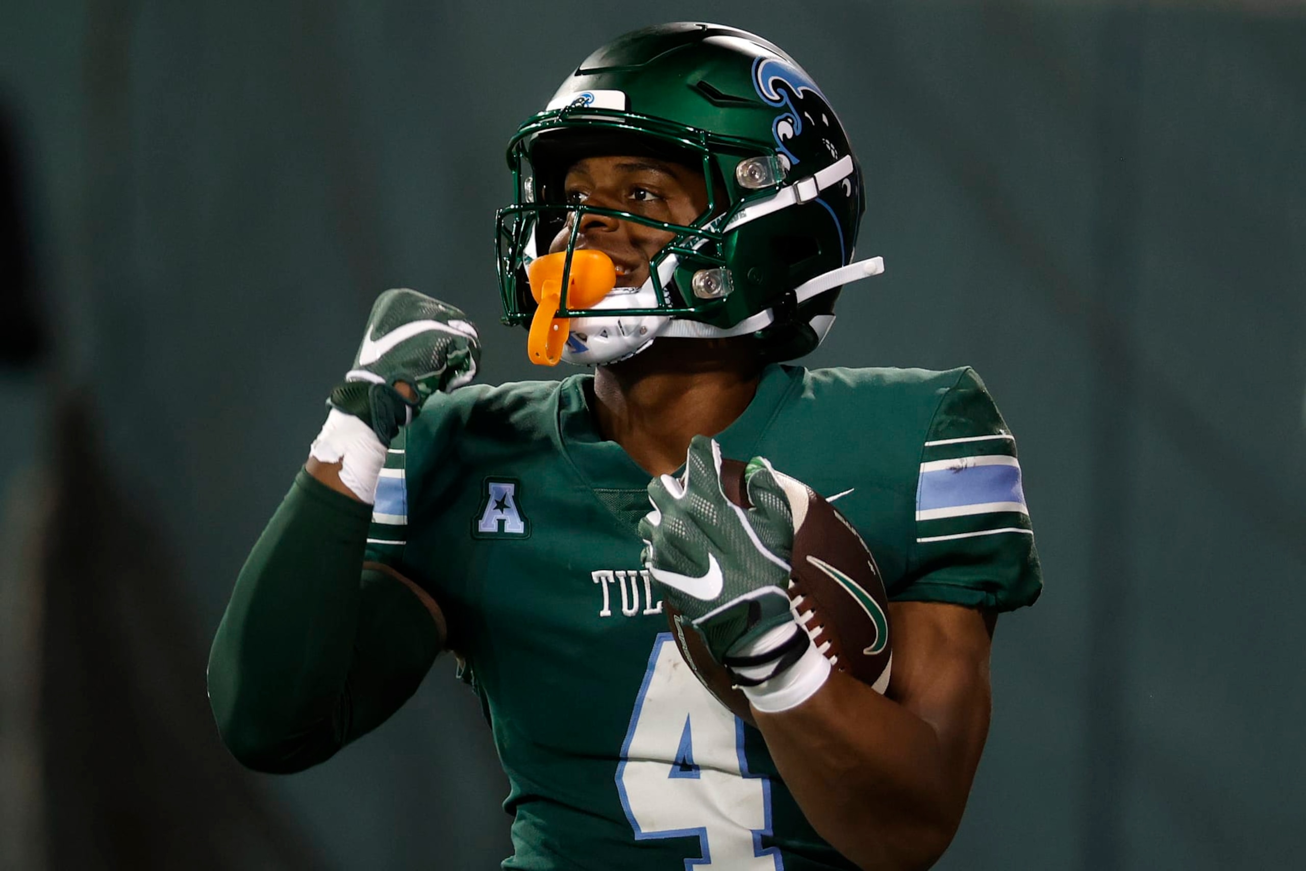 NEW ORLEANS, LOUISIANA - SEPTEMBER 02: Jha'Quan Jackson #4  of Tulane University Green Wave scores a touchdown against the University of Southern Alabama at Yulman Stadium on September 02, 2023 in New Orleans, Louisiana. (Photo by Chris Graythen/Getty Images)