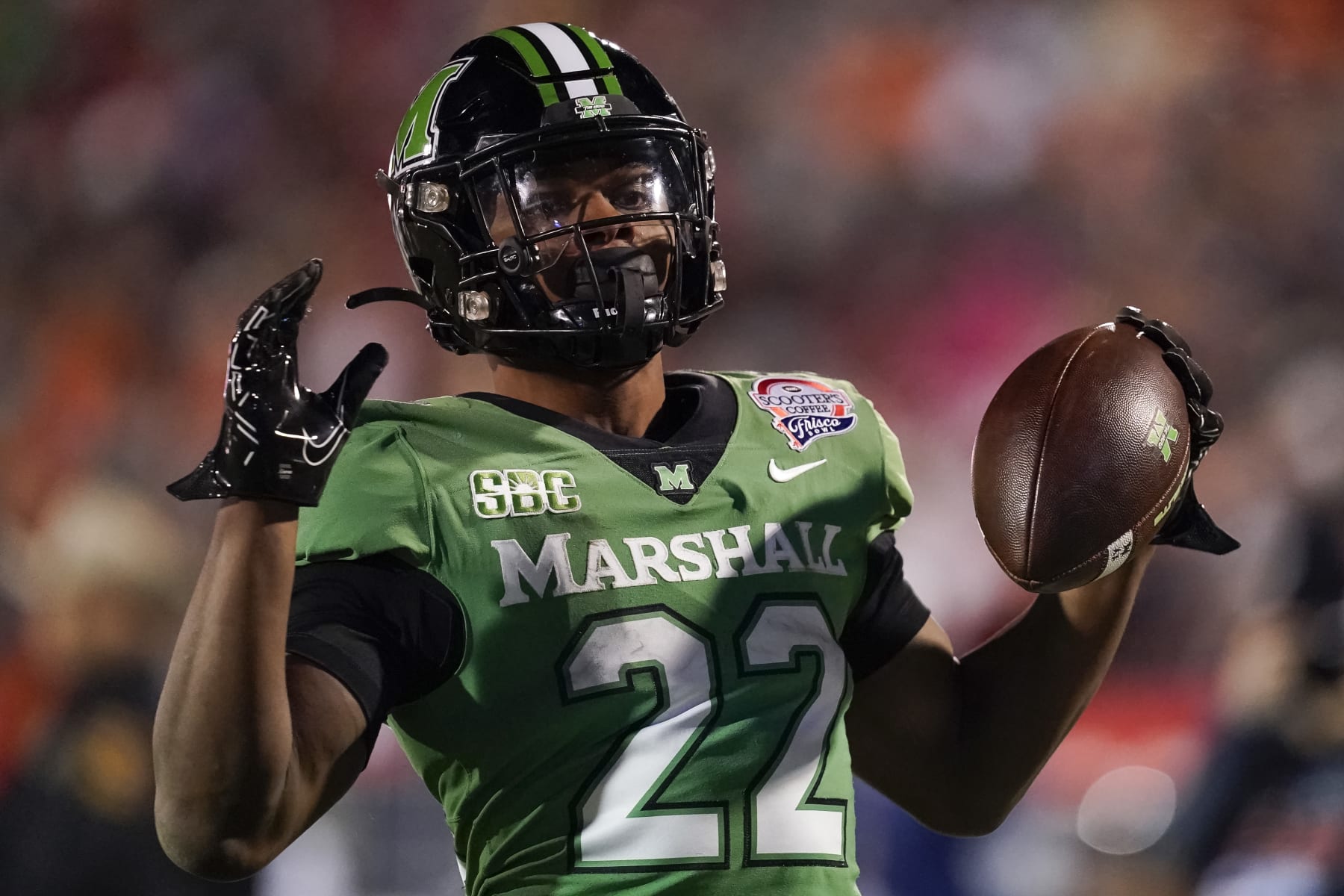 FRISCO, TEXAS - DECEMBER 19: Rasheen Ali #22 of the Marshall Thundering Herd holds the ball after running into the endzone for a touchdown during the first half of the Frisco Bowl against the UTSA Roadrunners at Toyota Stadium on December 19, 2023 in Frisco, Texas. (Photo by Sam Hodde/Getty Images)