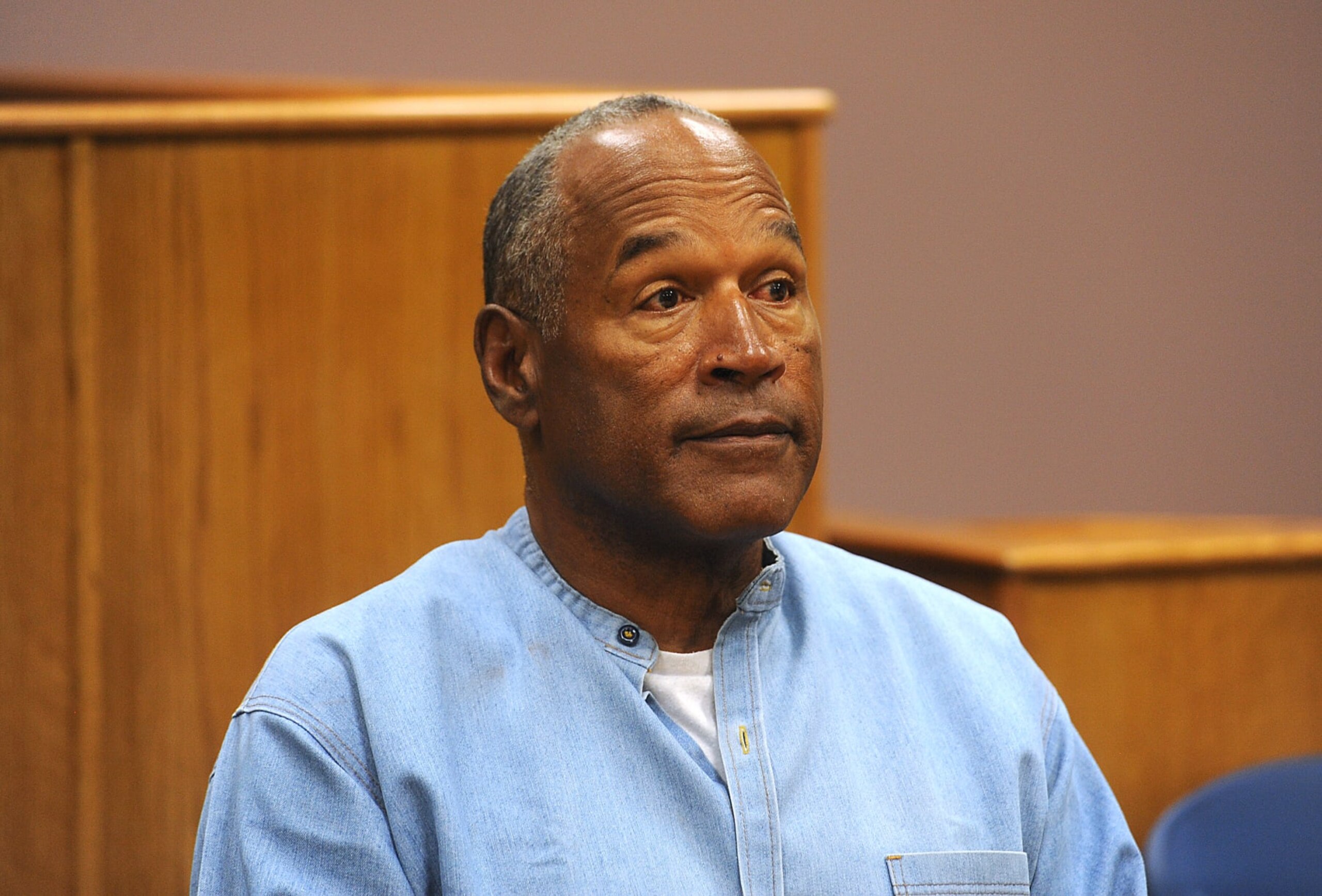 Former professional football player O.J. Simpson listens during a parole hearing at Lovelock Correctional Center in Lovelock, Nevada, U.S., on Thursday, July 20, 2017. Simpson has been granted parole nine years into a 33-year sentence and could be released as soon as Oct. 1. Photographer: Jason Bean/Pool via Bloomberg