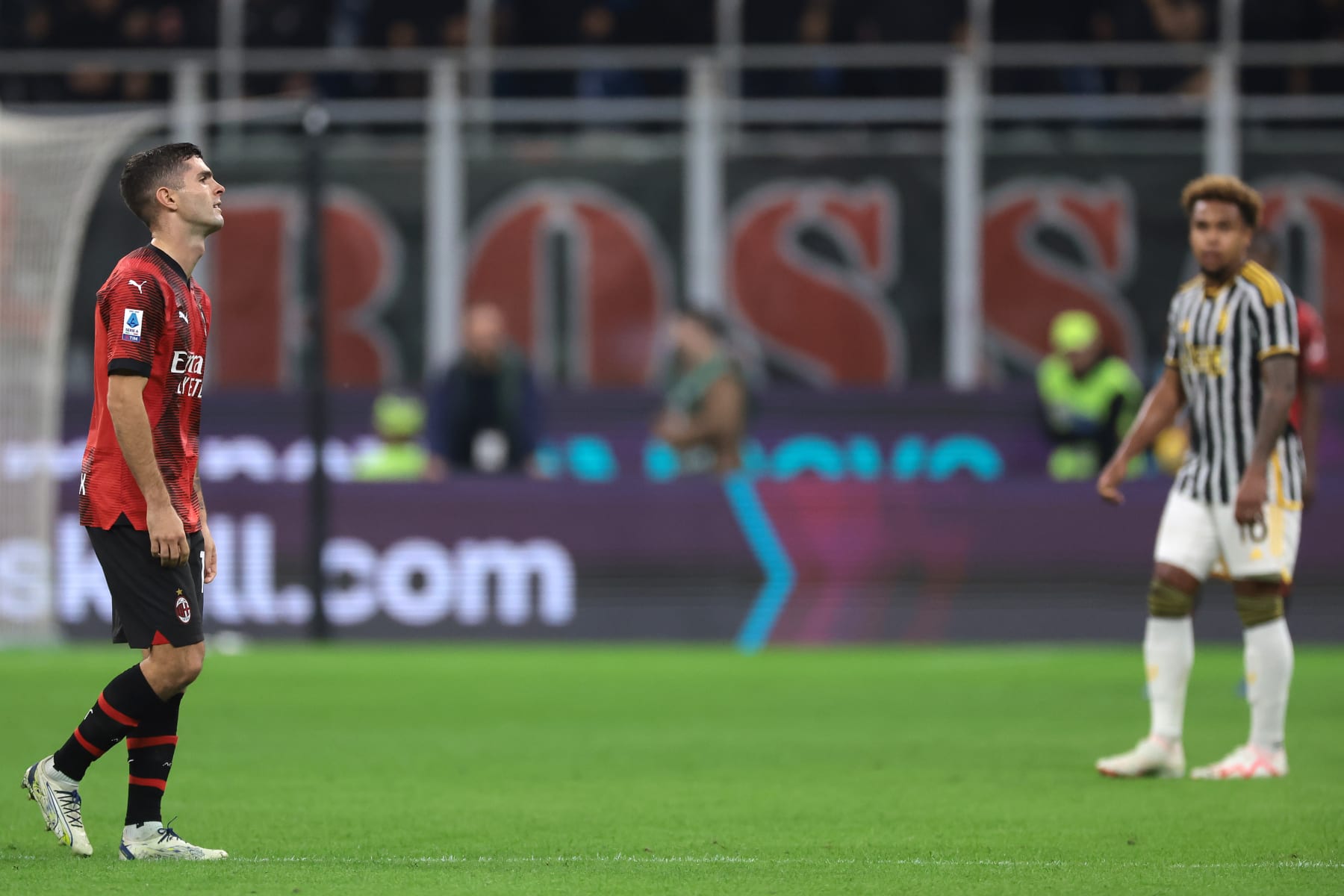MILAN, ITALY - OCTOBER 22: Weston McKennie of Juventus looks on as fellow American and national team colleague Christian Pulisic of AC Milan reacts as he is substituted in a tactical change by Stefano Pioli Head coach of AC Milan following the sending off of Malick Thiaw of AC Milan during the Serie A TIM match between AC Milan and Juventus FC at Stadio Giuseppe Meazza on October 22, 2023 in Milan, Italy. (Photo by Jonathan Moscrop/Getty Images)
