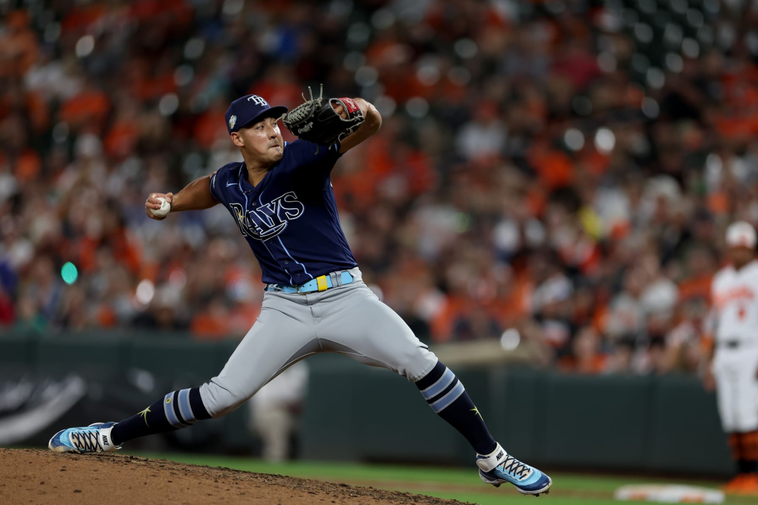 BALTIMORE, MARYLAND - SEPTEMBER 14: Robert Stephenson #26 of the Tampa Bay Rays pitches to a against the Baltimore Orioles batter at Oriole Park at Camden Yards on September 14, 2023 in Baltimore, Maryland. (Photo by Rob Carr/Getty Images) BALTIMORE, MARYLAND - SEPTEMBER 14: Robert Stephenson #26 of the Tampa Bay Rays pitches to a against the Baltimore Orioles batter at Oriole Park at Camden Yards on September 14, 2023 in Baltimore, Maryland. (Photo by Rob Carr/Getty Images)