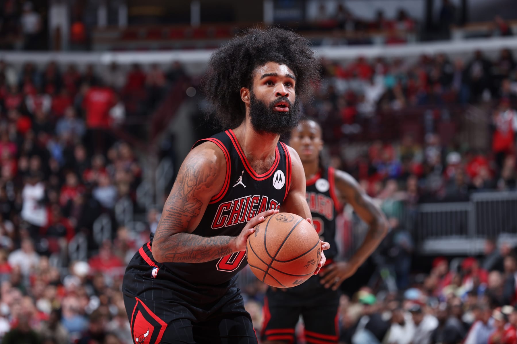 CHICAGO, IL - APRIL 17:  Coby White #0 of the Chicago Bulls shoots a free throw during the game against the Atlanta Hawks during the 2024 Play-In Tournament  on April 17, 2024 at United Center in Chicago, Illinois. NOTE TO USER: User expressly acknowledges and agrees that, by downloading and or using this photograph, User is consenting to the terms and conditions of the Getty Images License Agreement. Mandatory Copyright Notice: Copyright 2024 NBAE (Photo by Jeff Haynes/NBAE via Getty Images)