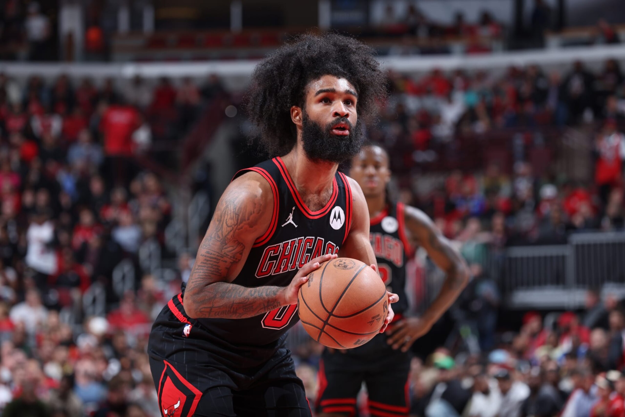 CHICAGO, IL - APRIL 17:  Coby White #0 of the Chicago Bulls shoots a free throw during the game against the Atlanta Hawks during the 2024 Play-In Tournament  on April 17, 2024 at United Center in Chicago, Illinois. NOTE TO USER: User expressly acknowledges and agrees that, by downloading and or using this photograph, User is consenting to the terms and conditions of the Getty Images License Agreement. Mandatory Copyright Notice: Copyright 2024 NBAE (Photo by Jeff Haynes/NBAE via Getty Images)
