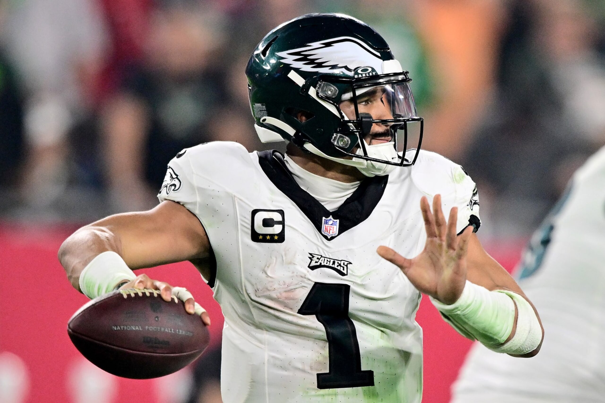 TAMPA, FLORIDA - JANUARY 15: Jalen Hurts #1 of the Philadelphia Eagles looks to pass against the Tampa Bay Buccaneers during the fourth quarter in the NFC Wild Card Playoffs at Raymond James Stadium on January 15, 2024 in Tampa, Florida. (Photo by Julio Aguilar/Getty Images)