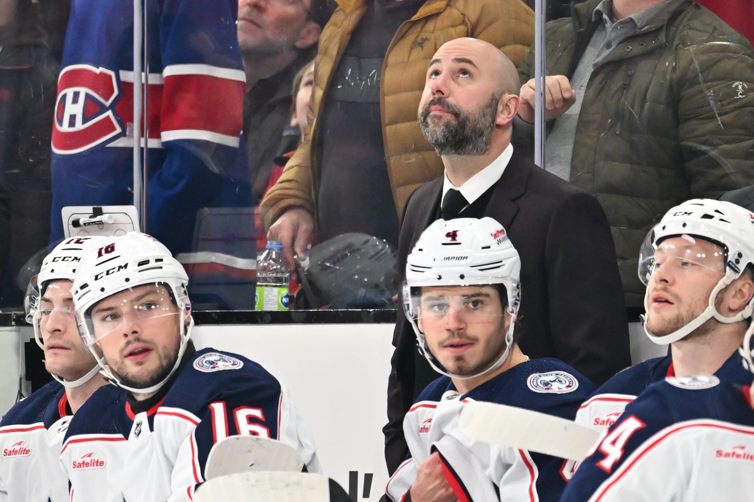 MONTREAL, CANADA - MARCH 12:  Head coach of the Columbus Blue Jackets Pascal Vincent, handles the bench during the first period against the Montreal Canadiens at the Bell Centre on March 12, 2024 in Montreal, Quebec, Canada.  The Montreal Canadiens defeated the Columbus Blue Jackets 3-0. (Photo by Minas Panagiotakis/Getty Images)