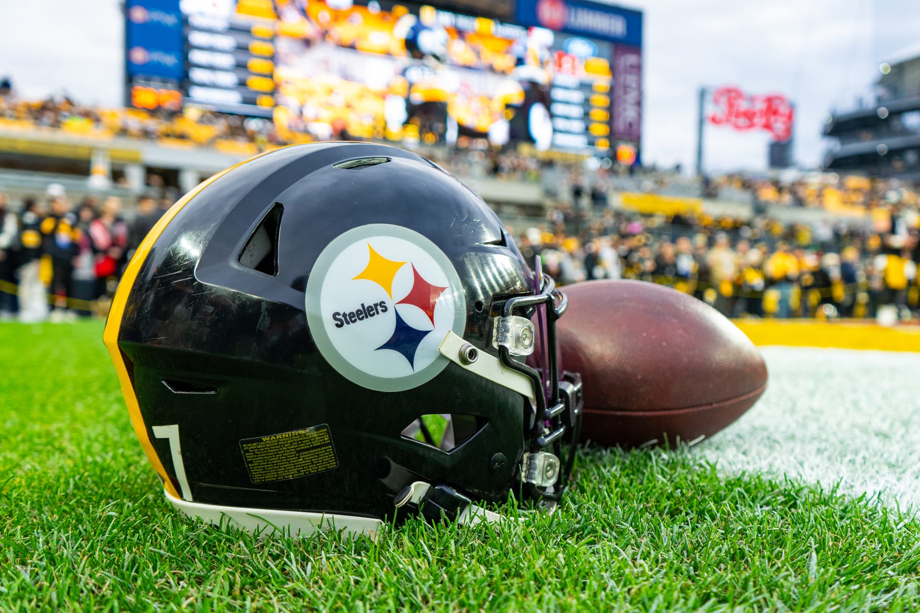 PITTSBURGH, PA - DECEMBER 23: A detailed view of a Pittsburgh Steelers helmet and football during the regular season NFL football game between the Cincinnati Bengals and Pittsburgh Steelers on December 23, 2023 at Acrisure Stadium in Pittsburgh, PA. (Photo by Mark Alberti/Icon Sportswire via Getty Images)