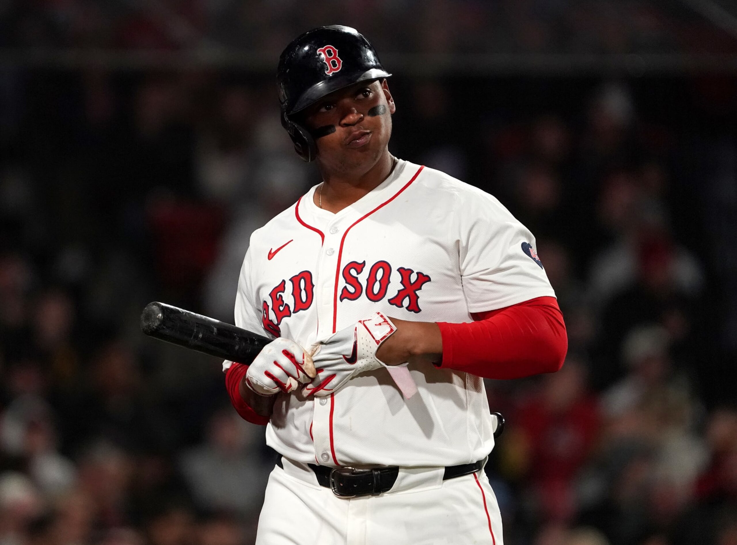 Boston, MA - April 17: Boston Red Sox designated hitter Rafael Devers reacts to his strikeout as he heads back to the dugout in the sixth inning. (Photo by Barry Chin/The Boston Globe via Getty Images)