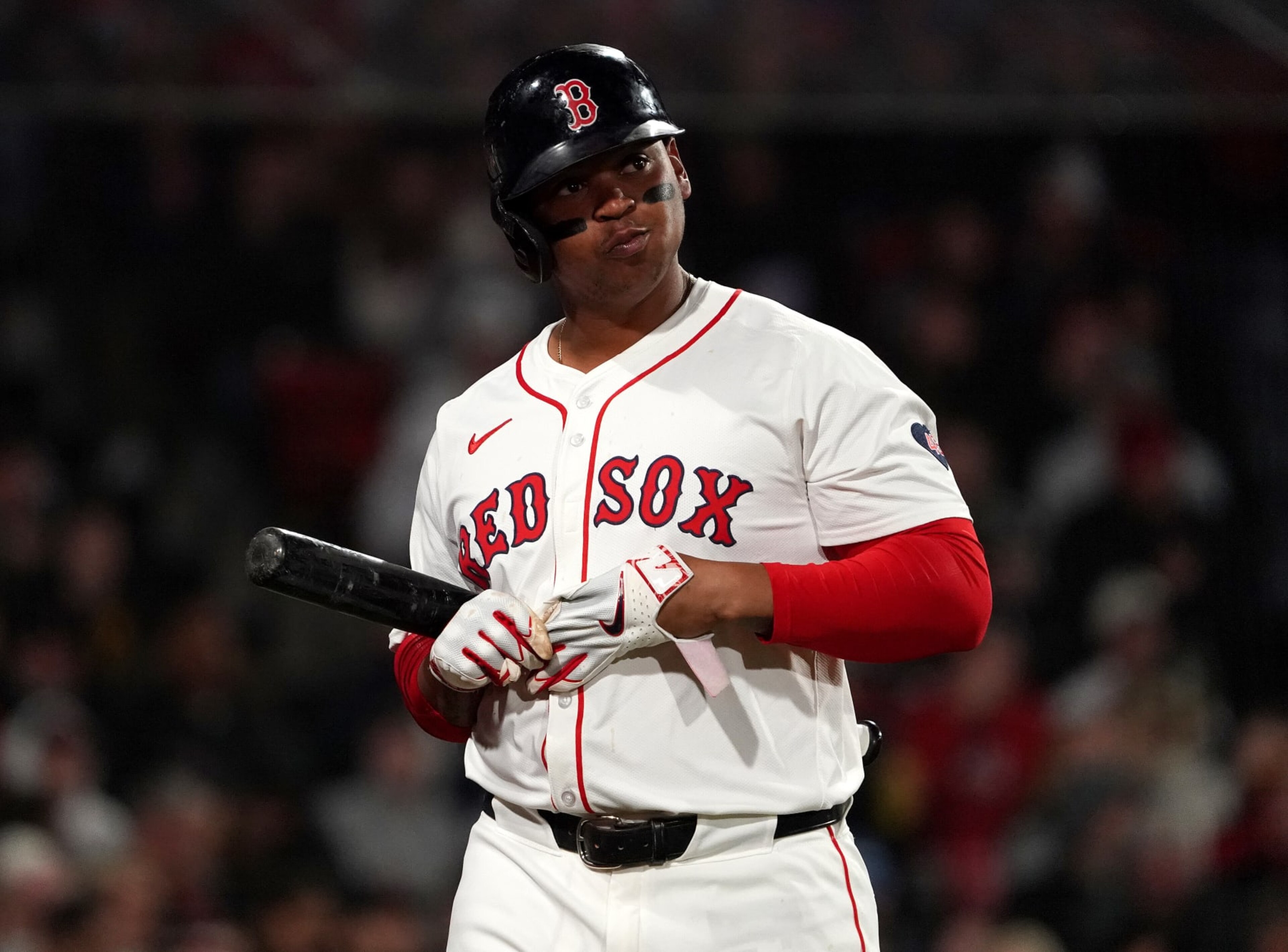 Boston, MA - April 17: Boston Red Sox designated hitter Rafael Devers reacts to his strikeout as he heads back to the dugout in the sixth inning. (Photo by Barry Chin/The Boston Globe via Getty Images)