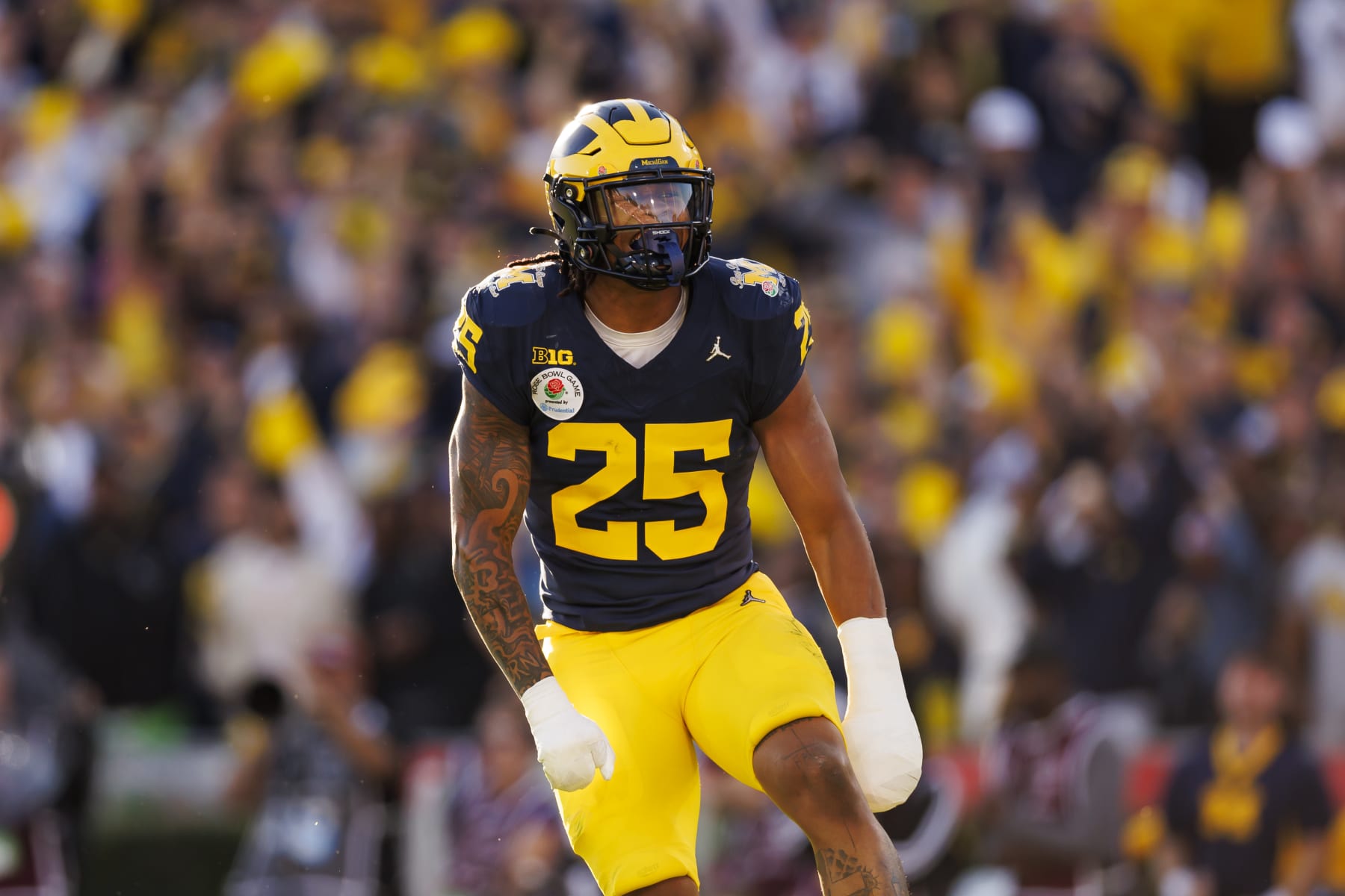 PASADENA, CALIFORNIA - JANUARY 01: Linebacker Junior Colson #25 of the Michigan Wolverines celebrates after a play during the CFP Semifinal Rose Bowl Game against the Alabama Crimson Tide at Rose Bowl Stadium on January 1, 2024 in Pasadena, California. (Photo by Ryan Kang/Getty Images)