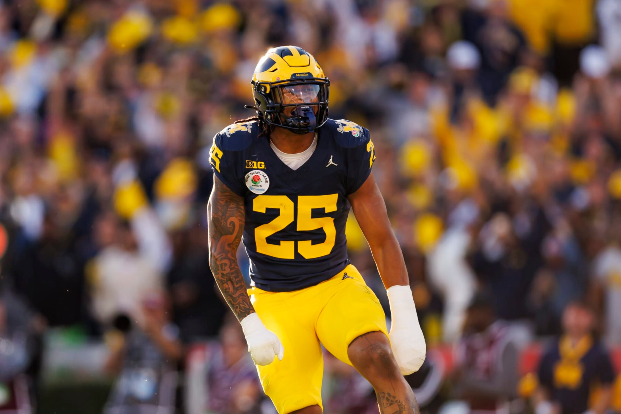PASADENA, CALIFORNIA - JANUARY 01: Linebacker Junior Colson #25 of the Michigan Wolverines celebrates after a play during the CFP Semifinal Rose Bowl Game against the Alabama Crimson Tide at Rose Bowl Stadium on January 1, 2024 in Pasadena, California. (Photo by Ryan Kang/Getty Images)