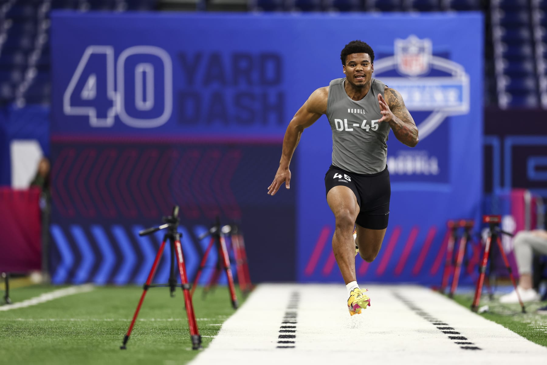 INDIANAPOLIS, INDIANA - FEBRUARY 29: Chop Robinson #DL45 of Penn State runs the the 40-yard dash during the NFL Combine at Lucas Oil Stadium on February 29, 2024 in Indianapolis, Indiana. (Photo by Kevin Sabitus/Getty Images)