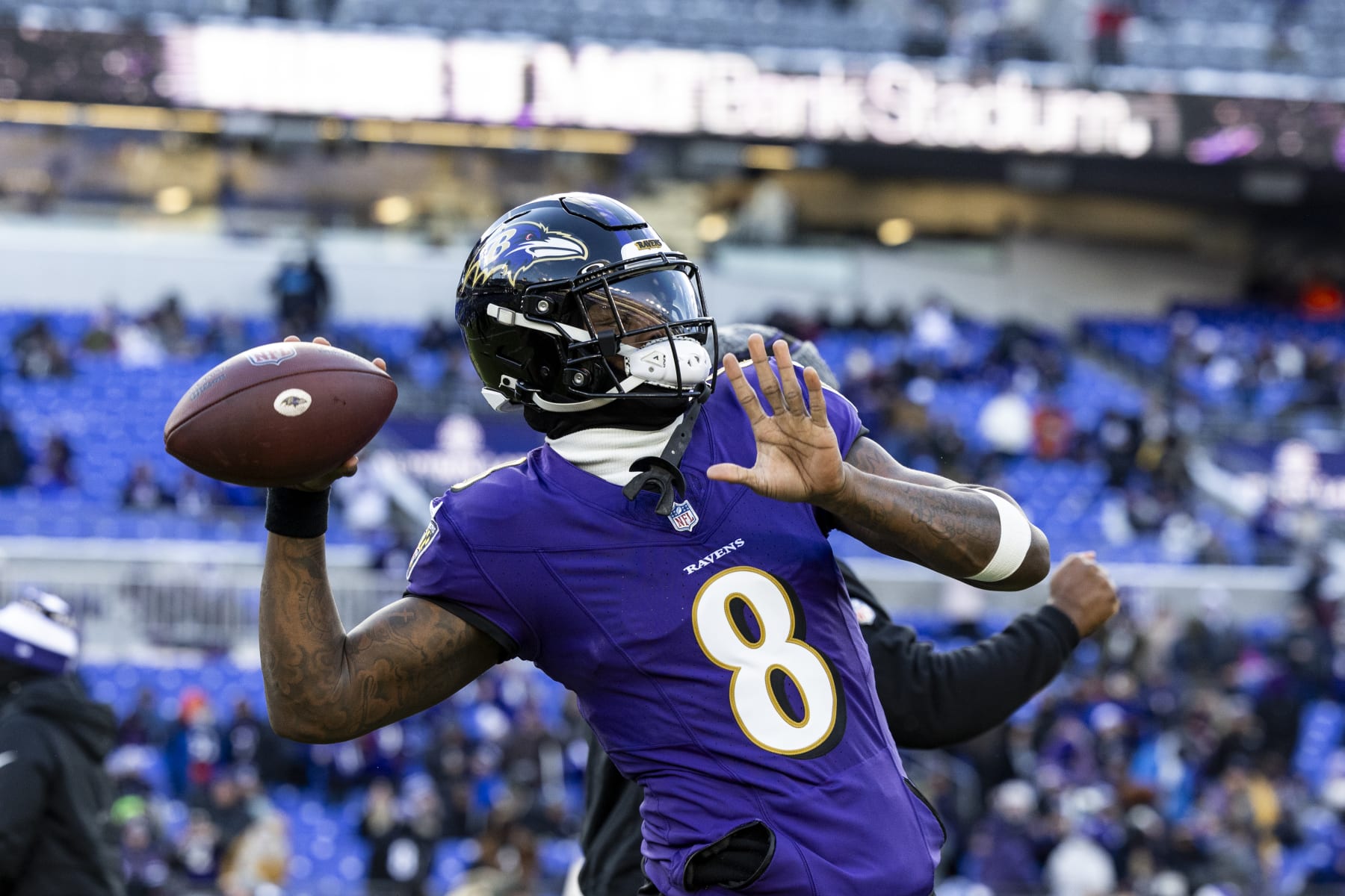 BALTIMORE, MARYLAND - JANUARY 20: Lamar Jackson #8 of the Baltimore Ravens warms up before the game against the Houston Texans at M&T Bank Stadium on January 20, 2024 in Baltimore, Maryland. The Ravens beat the Texans 34-10. (Photo by Lauren Leigh Bacho/Getty Images)