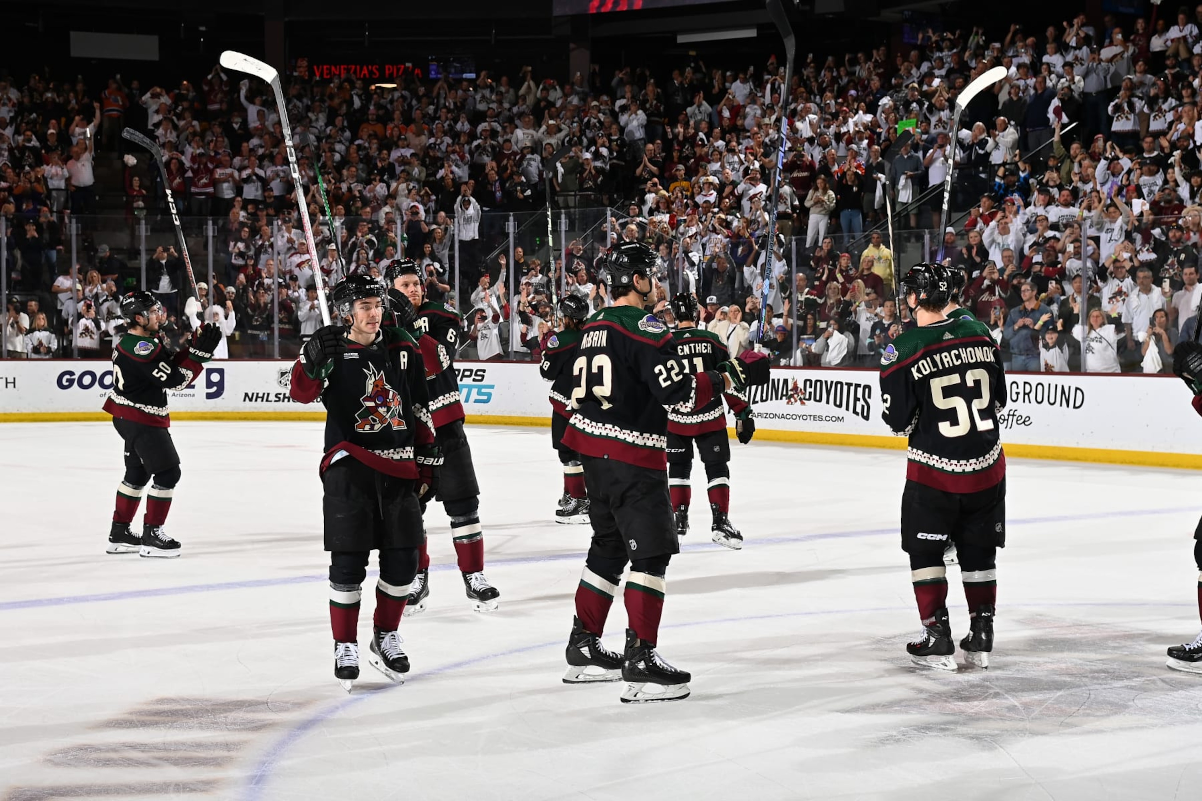 TEMPE, ARIZONA - APRIL 17: Clayton Keller #9, Jack McBain #22 of the Arizona Coyotes and teammates salute the fans after a 5-2 win against the Edmonton Oilers at Mullett Arena on April 17, 2024 in Tempe, Arizona. (Photo by Norm Hall/NHLI via Getty Images) TEMPE, ARIZONA - APRIL 17: Clayton Keller #9, Jack McBain #22 of the Arizona Coyotes and teammates salute the fans after a 5-2 win against the Edmonton Oilers at Mullett Arena on April 17, 2024 in Tempe, Arizona. (Photo by Norm Hall/NHLI via Getty Images)