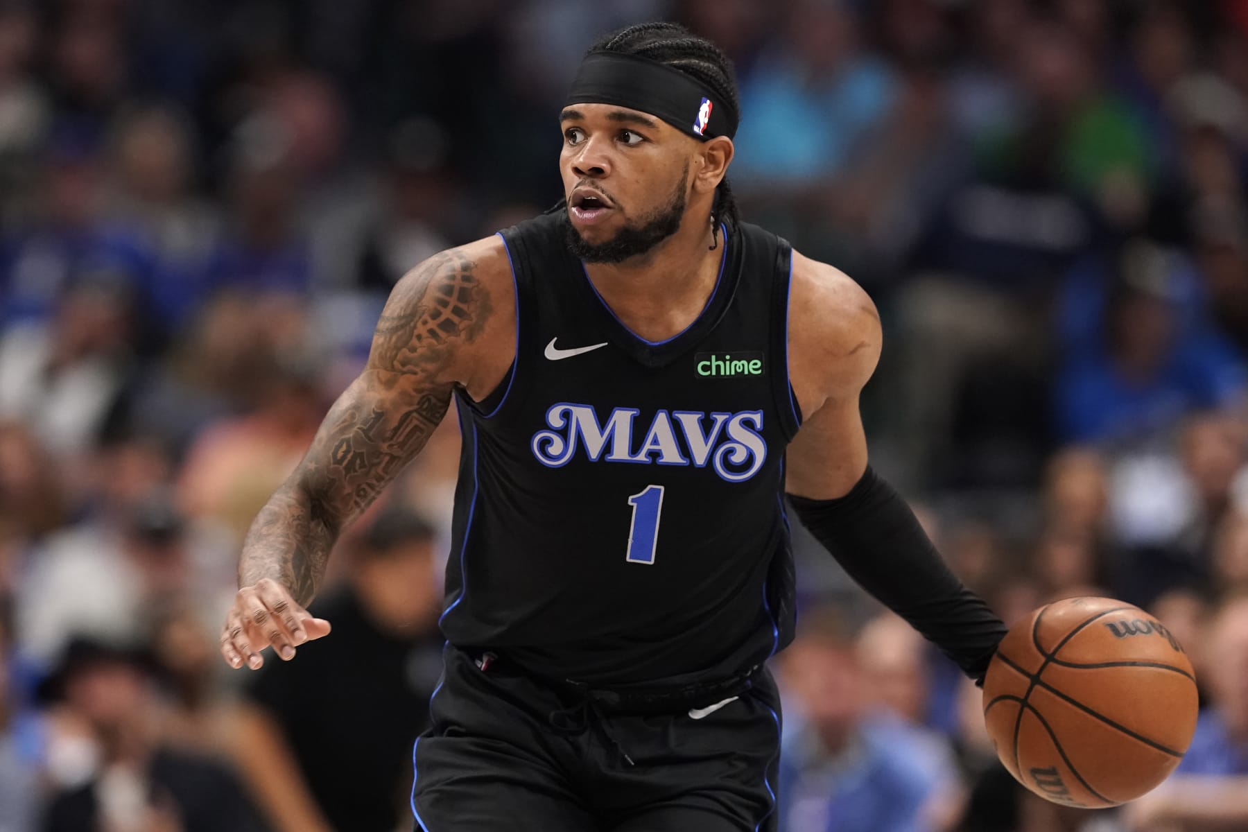 DALLAS, TEXAS - APRIL 12: Jaden Hardy #1 of the Dallas Mavericks brings the ball up the court during the first half against the Detroit Pistons at American Airlines Center on April 12, 2024 in Dallas, Texas. NOTE TO USER: User expressly acknowledges and agrees that, by downloading and or using this photograph, User is consenting to the terms and conditions of the Getty Images License Agreement. (Photo by Sam Hodde/Getty Images)