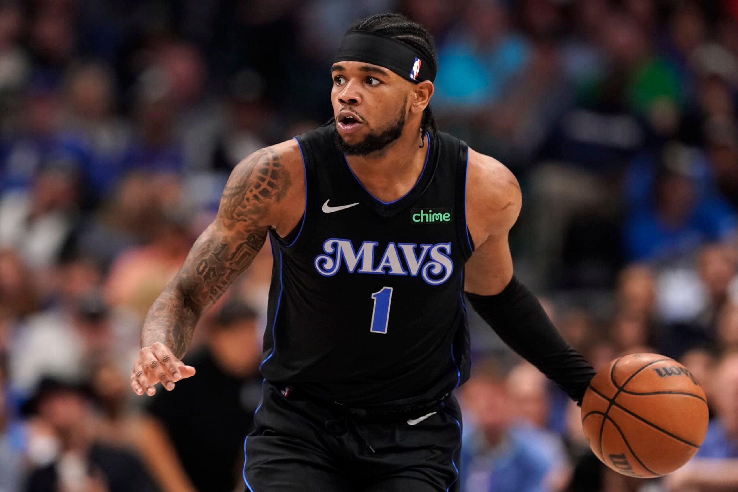 DALLAS, TEXAS - APRIL 12: Jaden Hardy #1 of the Dallas Mavericks brings the ball up the court during the first half against the Detroit Pistons at American Airlines Center on April 12, 2024 in Dallas, Texas. NOTE TO USER: User expressly acknowledges and agrees that, by downloading and or using this photograph, User is consenting to the terms and conditions of the Getty Images License Agreement. (Photo by Sam Hodde/Getty Images)