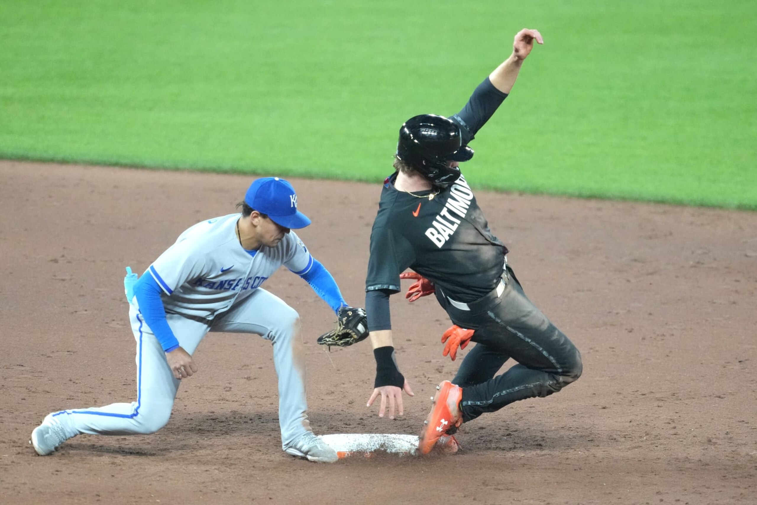 BALTIMORE, MARYLAND - JUNE 09: Bobby Witt Jr. #7 of the Kansas City Royals tags out Gunnar Henderson #2 of the Baltimore Orioles trying to steal second base in the sixth inning during a baseball game at Oriole Park at Camden Yards on June 9, 2023 in Baltimore, Maryland. (Photo by Mitchell Layton/Getty Images) BALTIMORE, MARYLAND - JUNE 09: Bobby Witt Jr. #7 of the Kansas City Royals tags out Gunnar Henderson #2 of the Baltimore Orioles trying to steal second base in the sixth inning during a baseball game at Oriole Park at Camden Yards on June 9, 2023 in Baltimore, Maryland. (Photo by Mitchell Layton/Getty Images)
