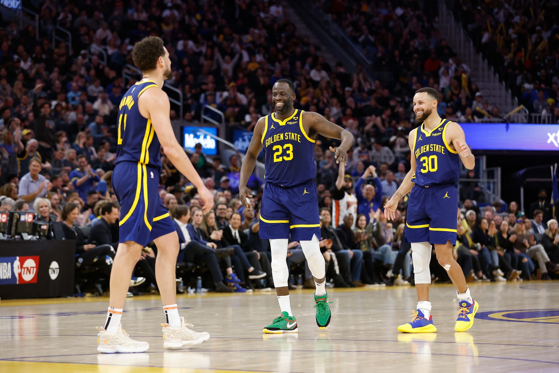 SAN FRANCISCO, CALIFORNIA - FEBRUARY 22: Klay Thompson #11, Draymond Green #23 and Stephen Curry #30 of the Golden State Warriors react after a play in the second half against the Los Angeles Lakers at Chase Center on February 22, 2024 in San Francisco, California. NOTE TO USER: User expressly acknowledges and agrees that, by downloading and or using this photograph, User is consenting to the terms and conditions of the Getty Images License Agreement. (Photo by Lachlan Cunningham/Getty Images)