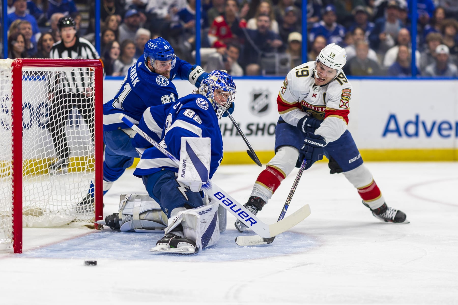 Erik Cernak, Andrei Vasilevskiy and Matthew Tkachuk.