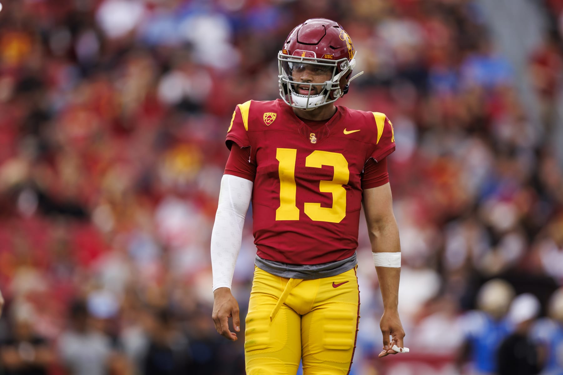 LOS ANGELES, CALIFORNIA - NOVEMBER 18: Caleb Williams #13 of the USC Trojans looks on during the first half of a game against the UCLA Bruins at United Airlines Field at the Los Angeles Memorial Coliseum on November 18, 2023 in Los Angeles, California. (Photo by Ryan Kang/Getty Images)
