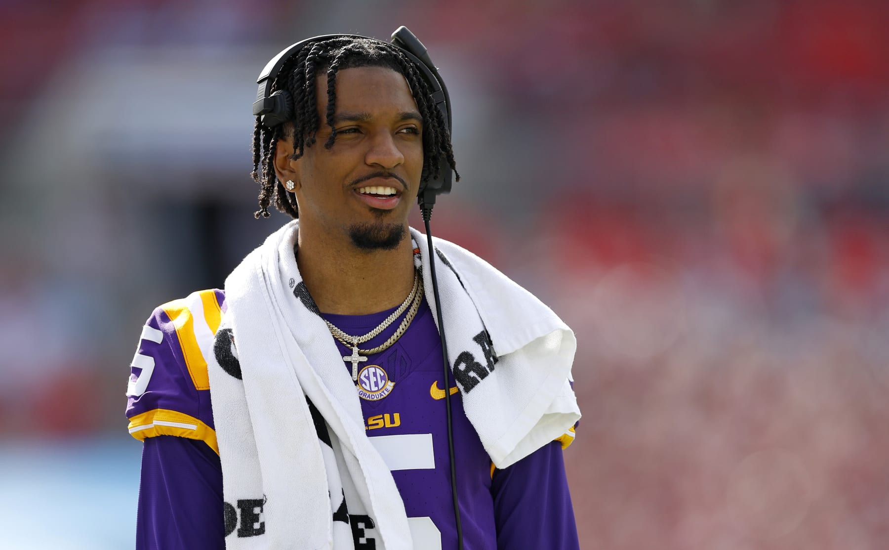 TAMPA, FLORIDA - JANUARY 01: Jayden Daniels #5 of the LSU Tigers looks on during the ReliaQuest Bowl against the Wisconsin Badgers at Raymond James Stadium on January 01, 2024 in Tampa, Florida. (Photo by Mike Ehrmann/Getty Images)