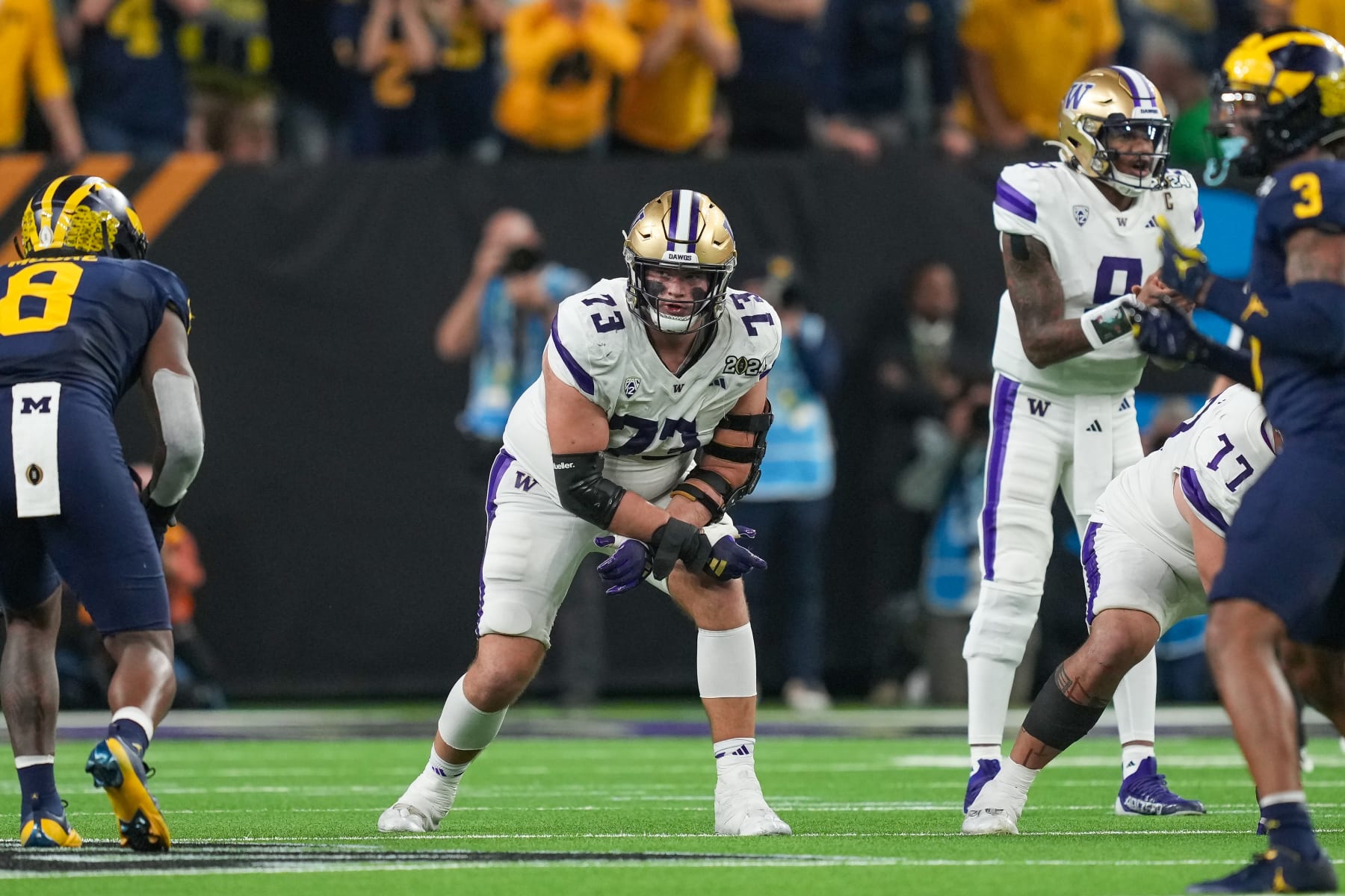 HOUSTON, TX - JANUARY 08: Washington Huskies offensive lineman Roger Rosengarten (73) gets ready for a play during the CFP National Championship game between the Michigan Wolverines and Washington Huskies on January 8, 2024 at NRG Stadium in Houston, Texas. (Photo by Daniel Dunn/Icon Sportswire via Getty Images)