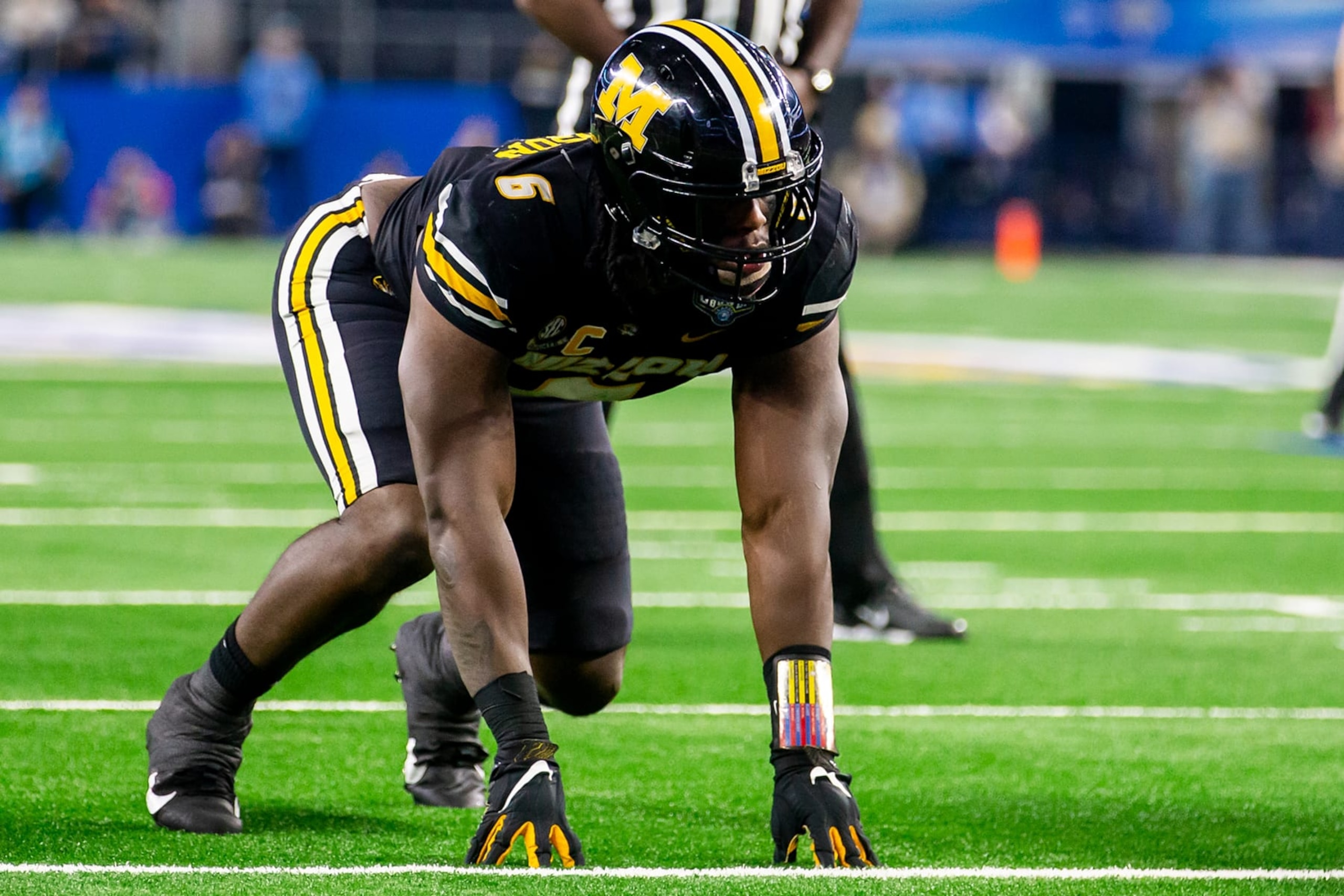 ARLINGTON, TX - DECEMBER 29: Missouri defensive lineman Darius Robinson (6) gets set at the line during the 88th annual Cotton Bowl game between the Missouri Tigers and the Ohio State Buckeyes on Friday, December 29, 2023 at AT&T Stadium in Arlington, TX. (Photo by Nick Tre. Smith/Icon Sportswire via Getty Images) ARLINGTON, TX - DECEMBER 29: Missouri defensive lineman Darius Robinson (6) gets set at the line during the 88th annual Cotton Bowl game between the Missouri Tigers and the Ohio State Buckeyes on Friday, December 29, 2023 at AT&T Stadium in Arlington, TX. (Photo by Nick Tre. Smith/Icon Sportswire via Getty Images)
