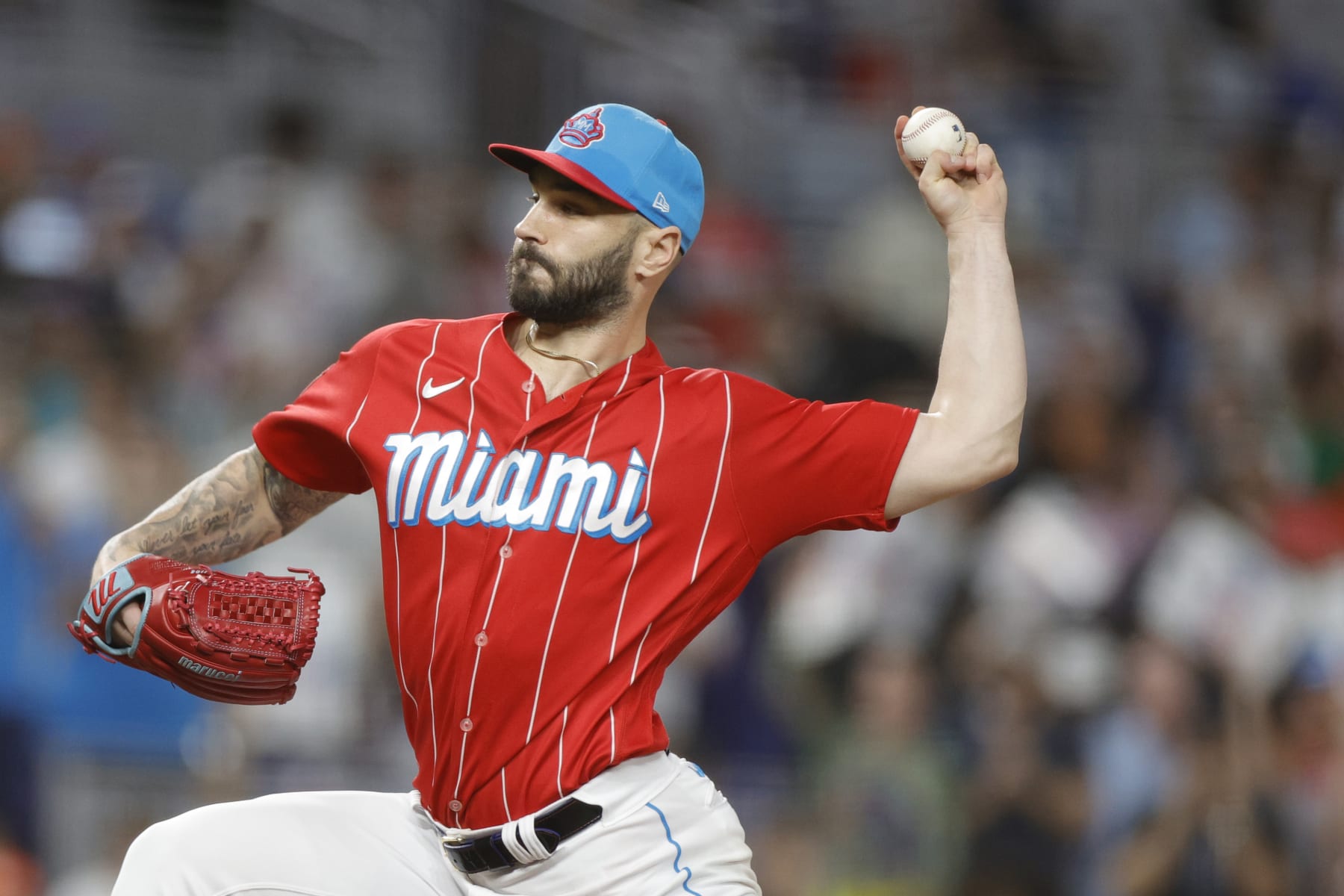 MIAMI, FLORIDA - SEPTEMBER 23: Tanner Scott #66 of the Miami Marlins strikes out Christian Yelich #22 of the Milwaukee Brewers to defeat the Milwaukee Brewers 5-4 at loanDepot park on September 23, 2023 in Miami, Florida. (Photo by Carmen Mandato/Getty Images)