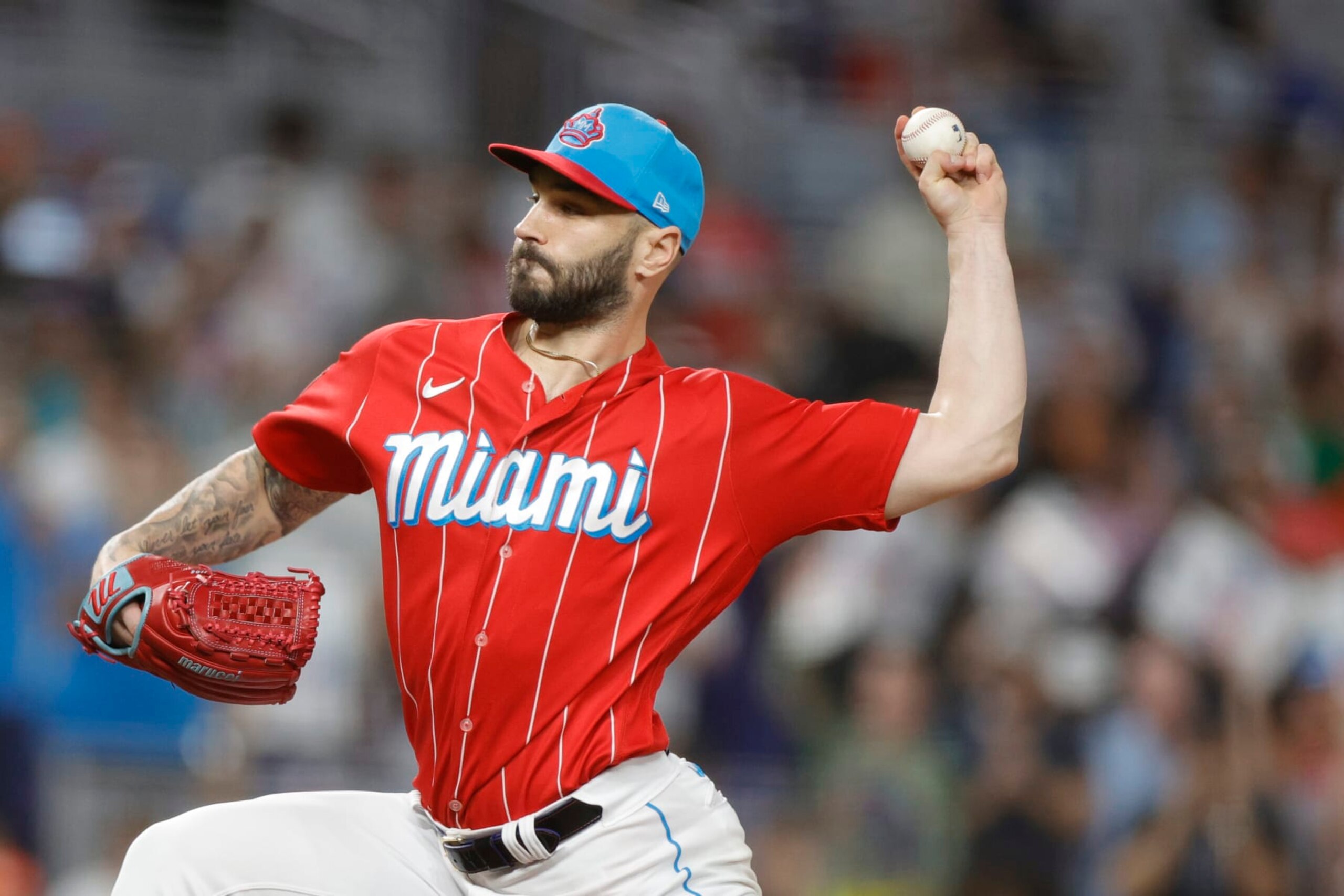 MIAMI, FLORIDA - SEPTEMBER 23: Tanner Scott #66 of the Miami Marlins strikes out Christian Yelich #22 of the Milwaukee Brewers to defeat the Milwaukee Brewers 5-4 at loanDepot park on September 23, 2023 in Miami, Florida. (Photo by Carmen Mandato/Getty Images)