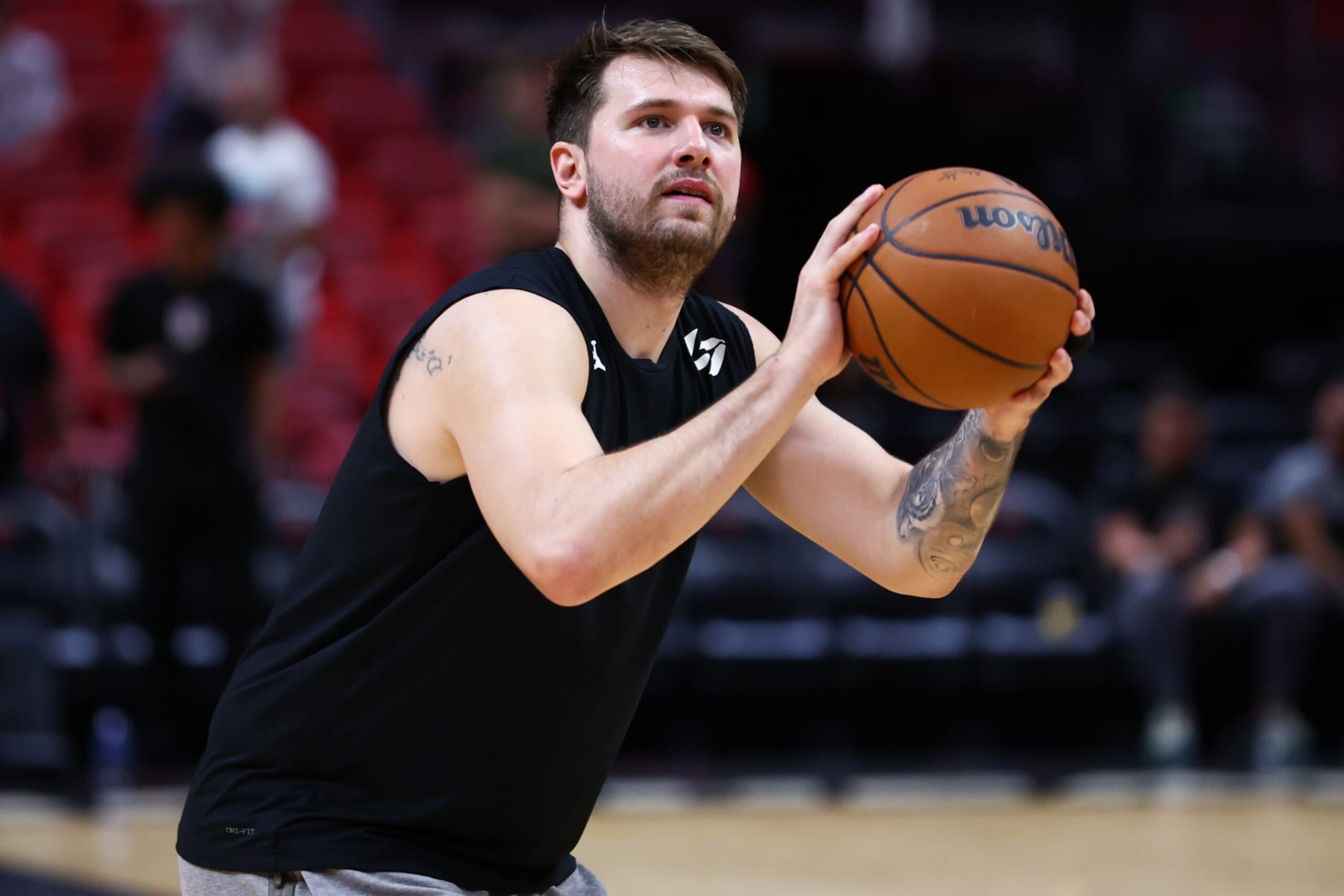 MIAMI, FLORIDA - APRIL 10: Luka Doncic #77 of the Dallas Mavericks warms up prior to a game against the Miami Heat at Kaseya Center on April 10, 2024 in Miami, Florida. NOTE TO USER: User expressly acknowledges and agrees that, by downloading and or using this photograph, User is consenting to the terms and conditions of the Getty Images License Agreement. (Photo by Megan Briggs/Getty Images) MIAMI, FLORIDA - APRIL 10: Luka Doncic #77 of the Dallas Mavericks warms up prior to a game against the Miami Heat at Kaseya Center on April 10, 2024 in Miami, Florida. NOTE TO USER: User expressly acknowledges and agrees that, by downloading and or using this photograph, User is consenting to the terms and conditions of the Getty Images License Agreement. (Photo by Megan Briggs/Getty Images)