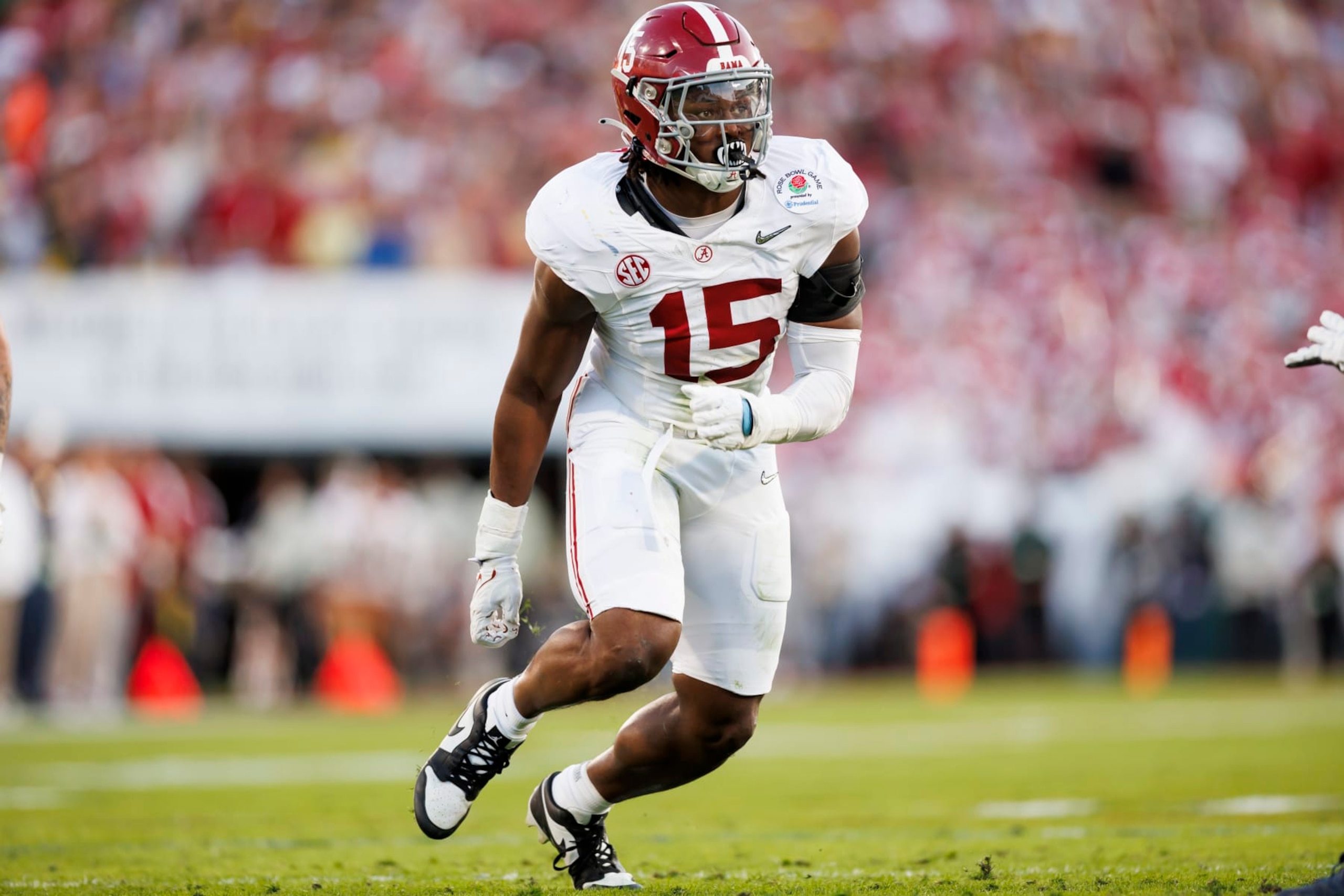 PASADENA, CALIFORNIA - JANUARY 01: Linebacker Dallas Turner #15 of the Alabama Crimson Tide runs around the edge during the CFP Semifinal Rose Bowl Game against the Michigan Wolverines at Rose Bowl Stadium on January 1, 2024 in Pasadena, California. (Photo by Ryan Kang/Getty Images) PASADENA, CALIFORNIA - JANUARY 01: Linebacker Dallas Turner #15 of the Alabama Crimson Tide runs around the edge during the CFP Semifinal Rose Bowl Game against the Michigan Wolverines at Rose Bowl Stadium on January 1, 2024 in Pasadena, California. (Photo by Ryan Kang/Getty Images)