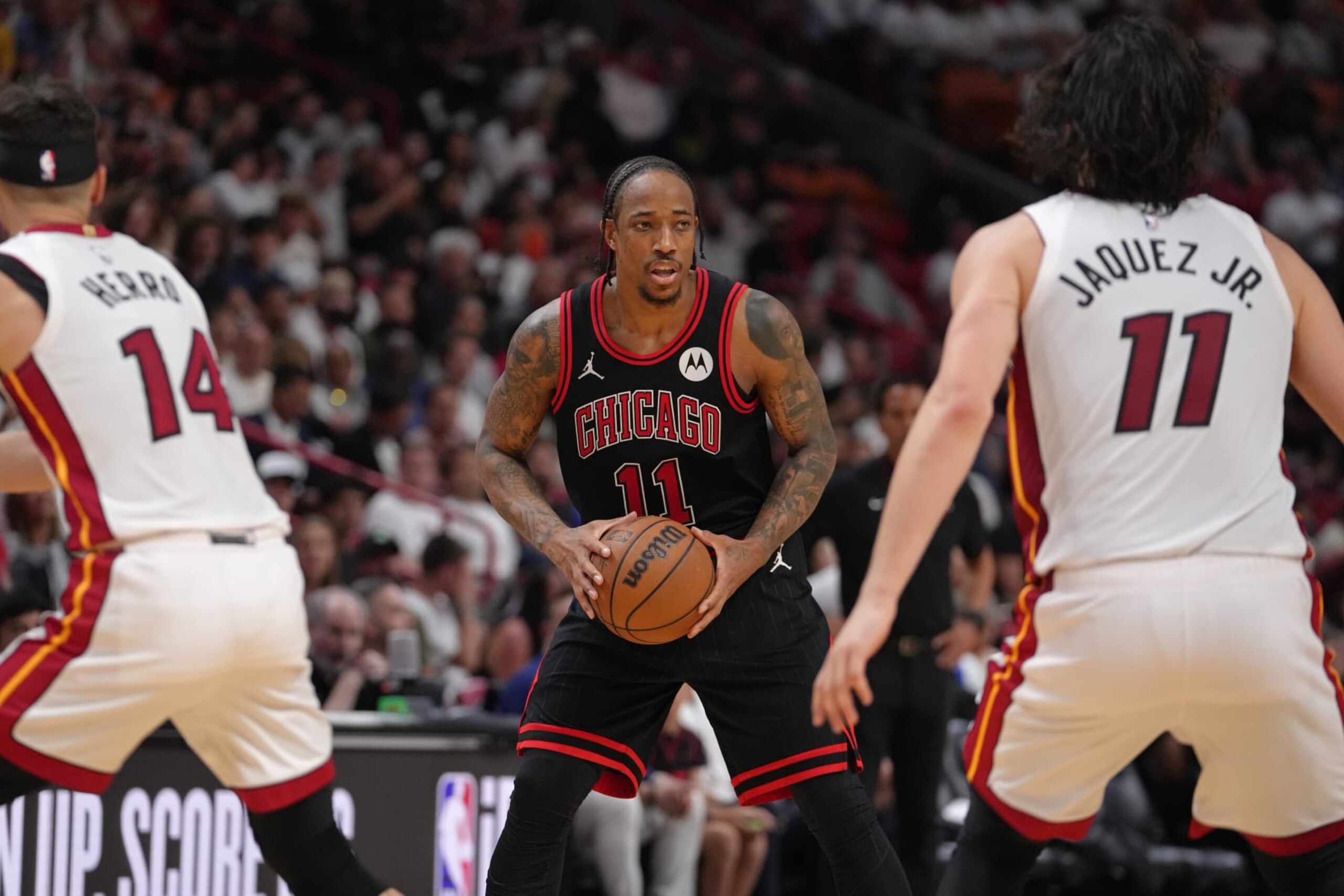 MIAMI, FL - APRIL 19: DeMar DeRozan #11 of the Chicago Bulls looks on during the game against the Miami Heat during the 2024 SoFi Play-In Tournament on April 19, 2024 at Kaseya Center in Miami, Florida. NOTE TO USER: User expressly acknowledges and agrees that, by downloading and or using this Photograph, user is consenting to the terms and conditions of the Getty Images License Agreement. Mandatory Copyright Notice: Copyright 2024 NBAE (Photo by Eric Espada/NBAE via Getty Images)