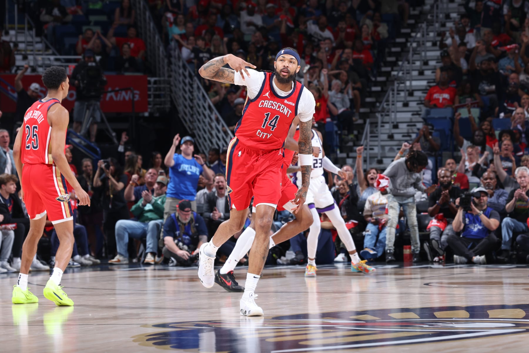 NEW ORLEANS, LA - APRIL 19:  Brandon Ingram #14 of the New Orleans Pelicans celebrates during the game against the Sacramento Kings during the 2024 Play-In Tournament on April 19, 2024 at the Smoothie King Center in New Orleans, Louisiana. NOTE TO USER: User expressly acknowledges and agrees that, by downloading and or using this Photograph, user is consenting to the terms and conditions of the Getty Images License Agreement. Mandatory Copyright Notice: Copyright 2024 NBAE (Photo by Jeff Haynes./NBAE via Getty Images)