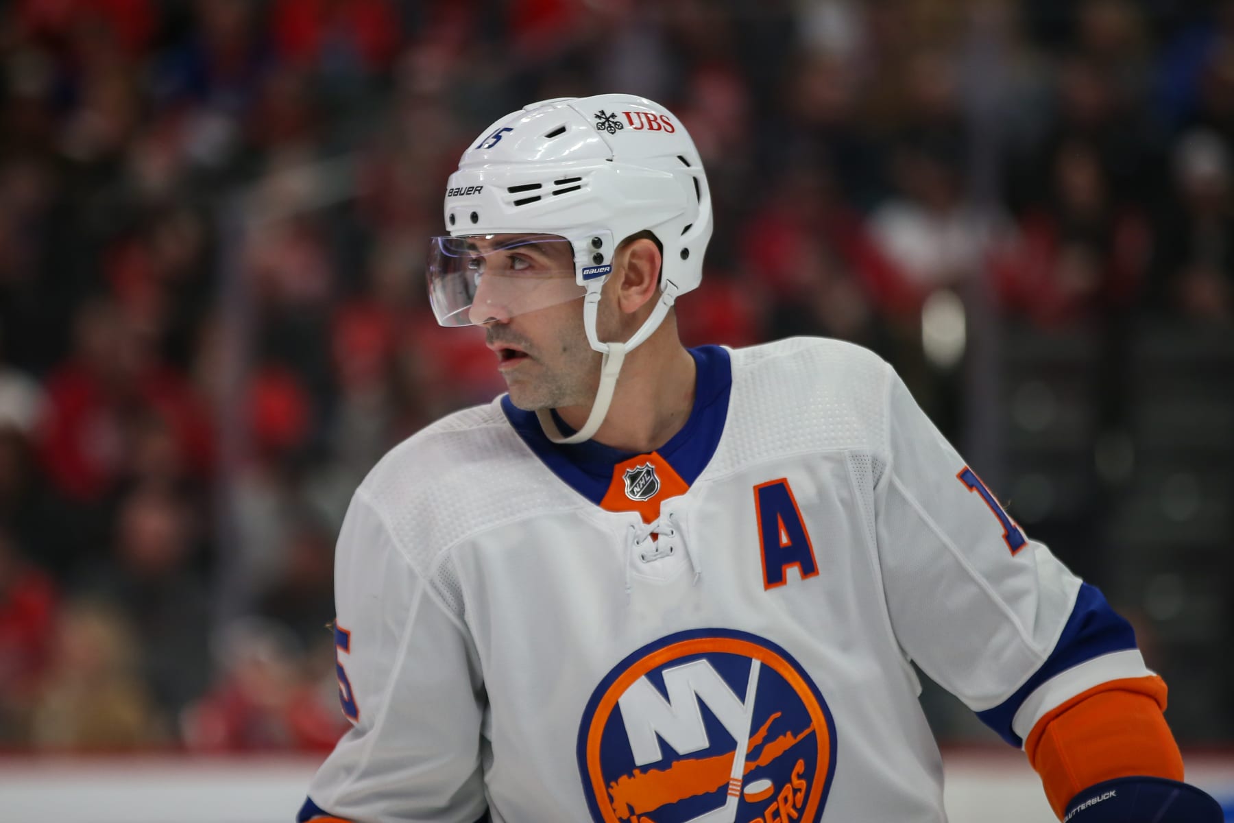 DETROIT, MI - MARCH 21:  New York Islanders forward Cal Clutterbuck (15) looks on during the first period of an NHL regular season hockey game between the New York Islanders and the Detroit Red Wings on March 21, 2024 at Little Caesars Arena in Detroit, Michigan. (Photo by Scott W. Grau/Icon Sportswire via Getty Images)