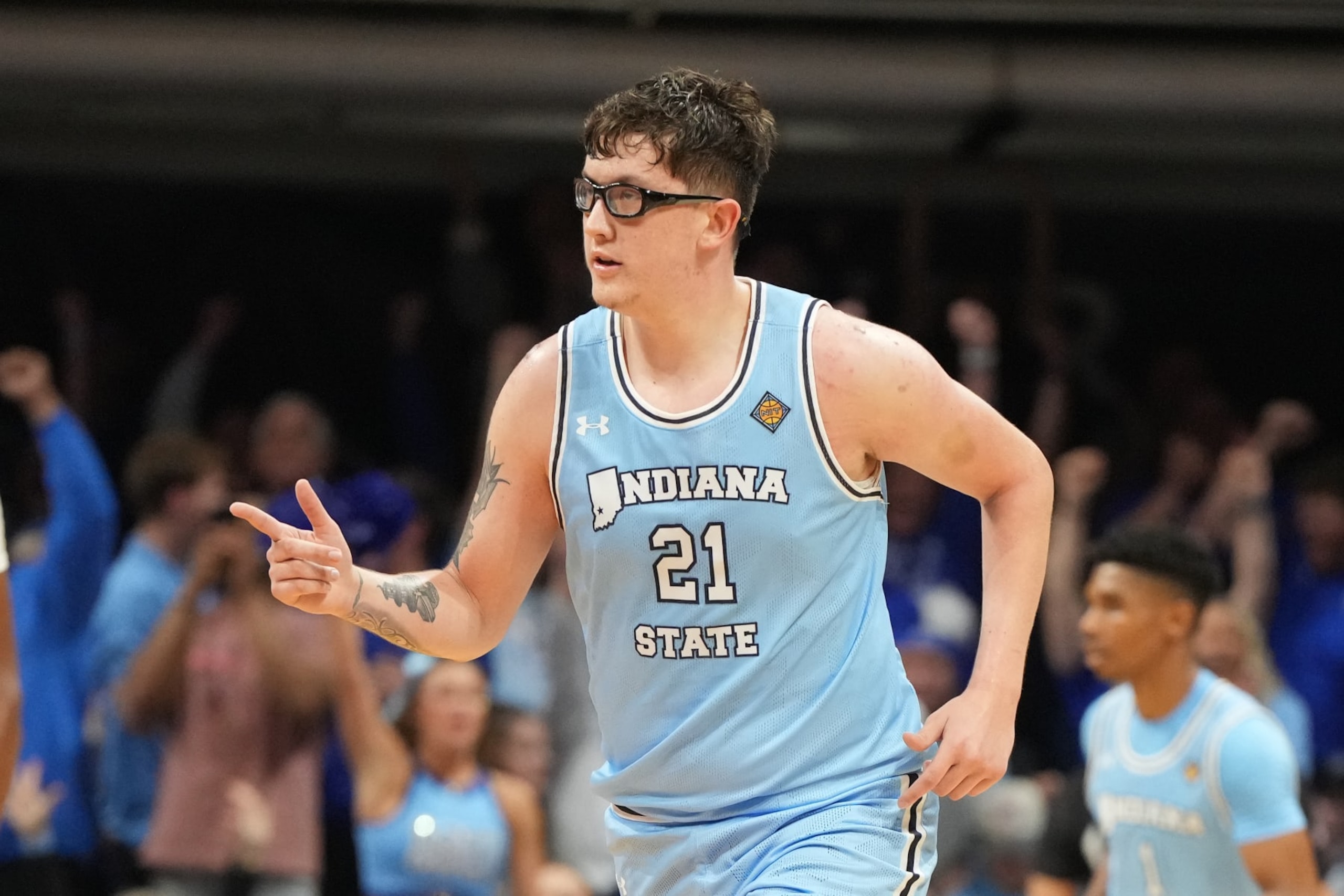 INDIANAPOLIS, INDIANA - APRIL 04:  Robbie Avila #21 of the Indiana State Sycamores celebrates a shot during the NIT Final college basketball game against the against the Seton Hall Pirates at Hinkle Fieldhouse on April 4, 2024 in Indianapolis, Indiana  (Photo by Mitchell Layton/Getty Images)